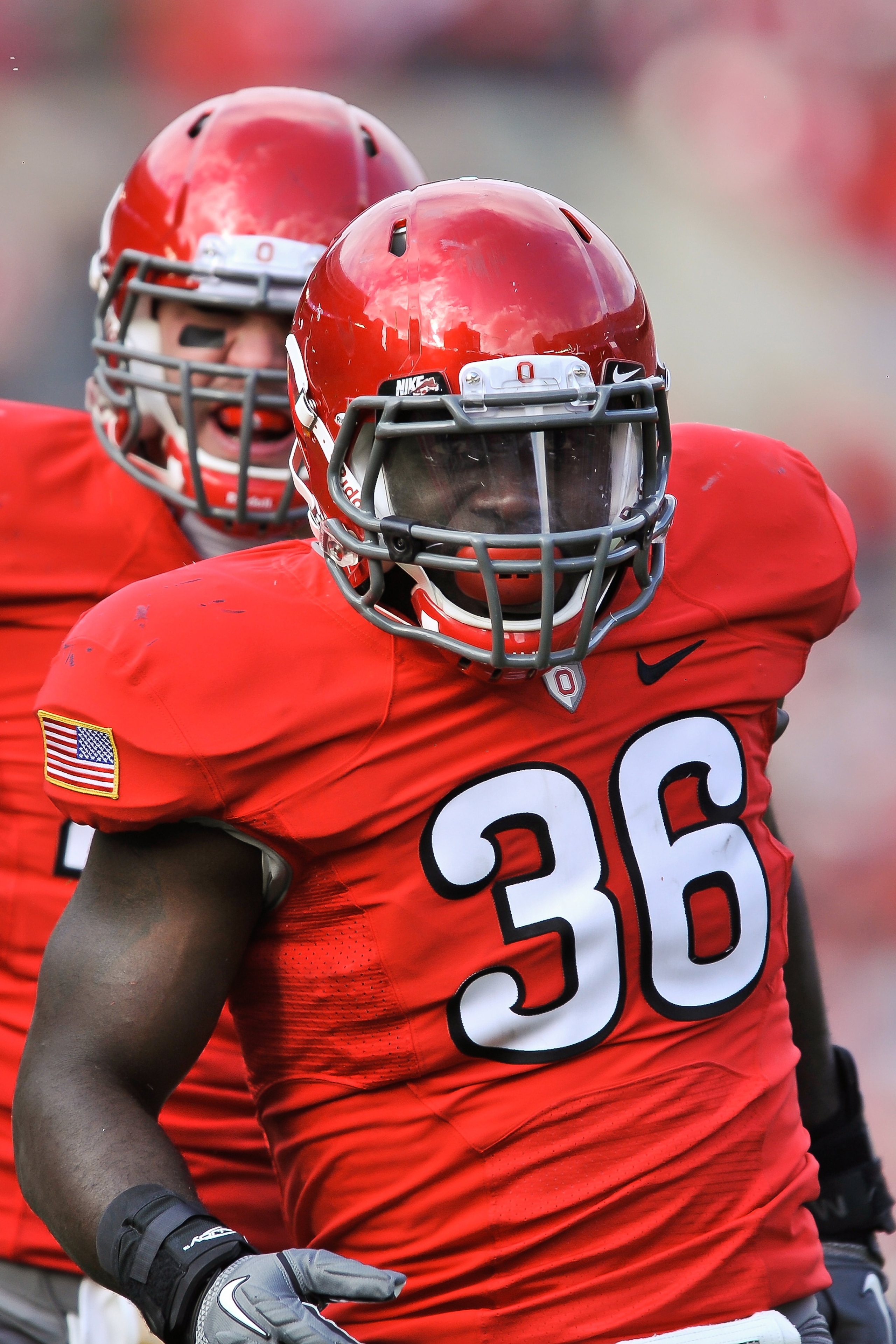 COLUMBUS, OH - NOVEMBER 27:  Brian Rolle #36 of the Ohio State Buckeyes celebrates after a tackle for a loss against the Michigan Wolverines at Ohio Stadium on November 27, 2010 in Columbus, Ohio.  (Photo by Jamie Sabau/Getty Images)