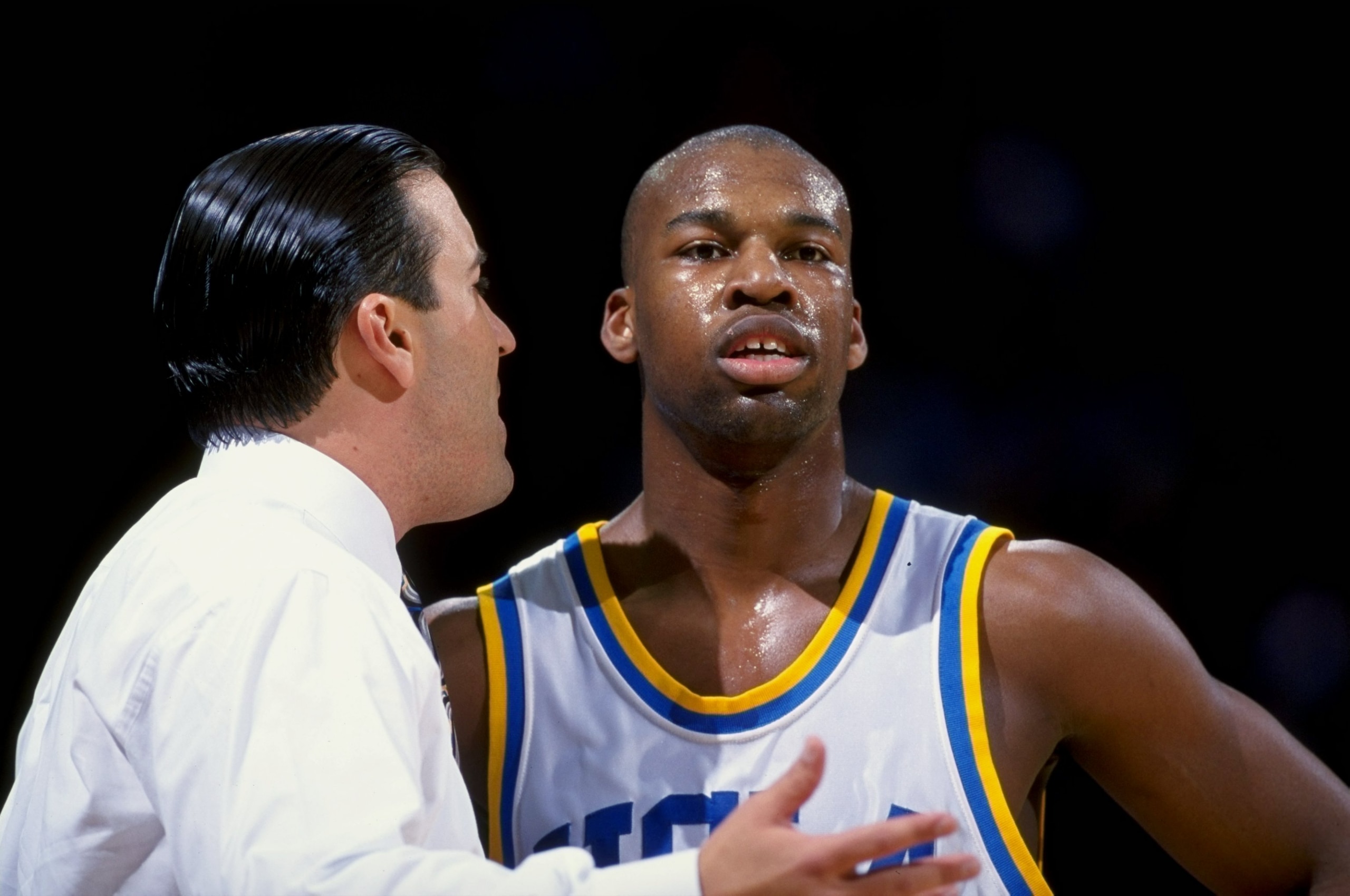 21 Feb 1999: Baron Davis #5 of the UCLA Bruins listens to head coach Steve Lavin during the game against the  Syracuse Orangemen at the Pauley Pavilion in Westwood, California. The Bruins defeated the Orangemen 93-69. Mandatory Credit: Tom Hauck  /Allspor
