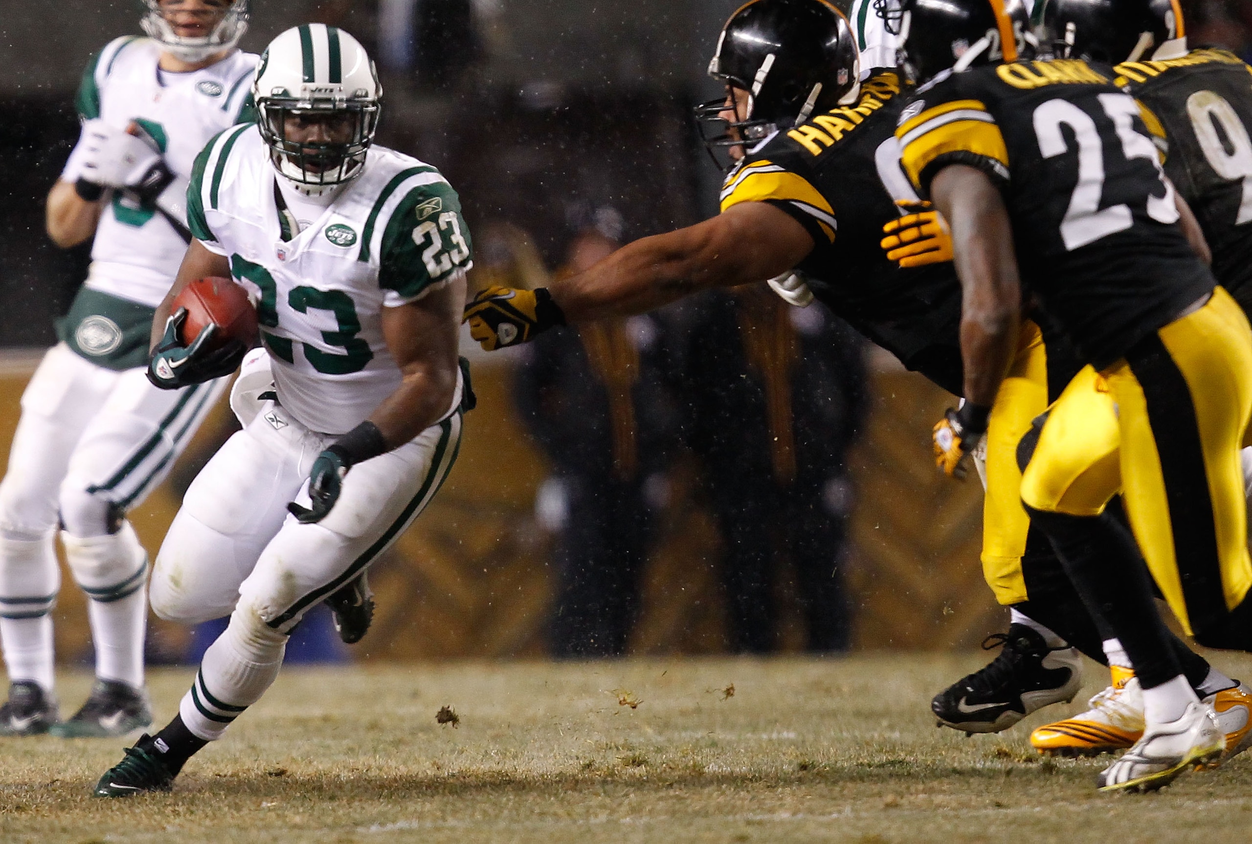 PITTSBURGH - DECEMBER 19:  Shonn Greene #23 of the New York Jets runs by the Pittsburgh Steelers defense during the game on December 19, 2010 at Heinz Field in Pittsburgh, Pennsylvania.  (Photo by Jared Wickerham/Getty Images)