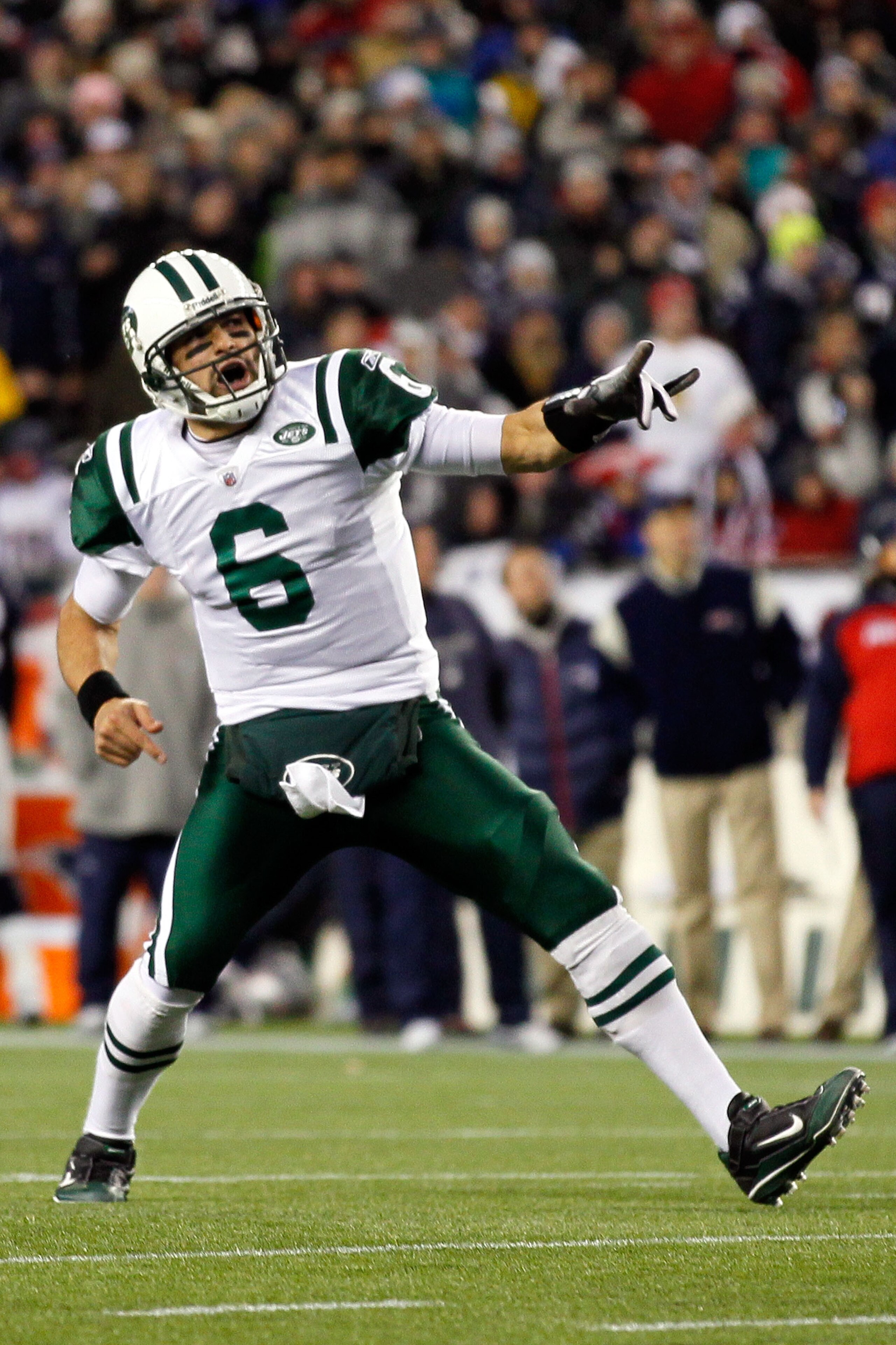 FOXBORO, MA - JANUARY 16:  Mark Sanchez #6 of the New York Jets celebrates a second quarter touchdown during their 2011 AFC divisional playoff game against the New England Patriots at Gillette Stadium on January 16, 2011 in Foxboro, Massachusetts.  (Photo