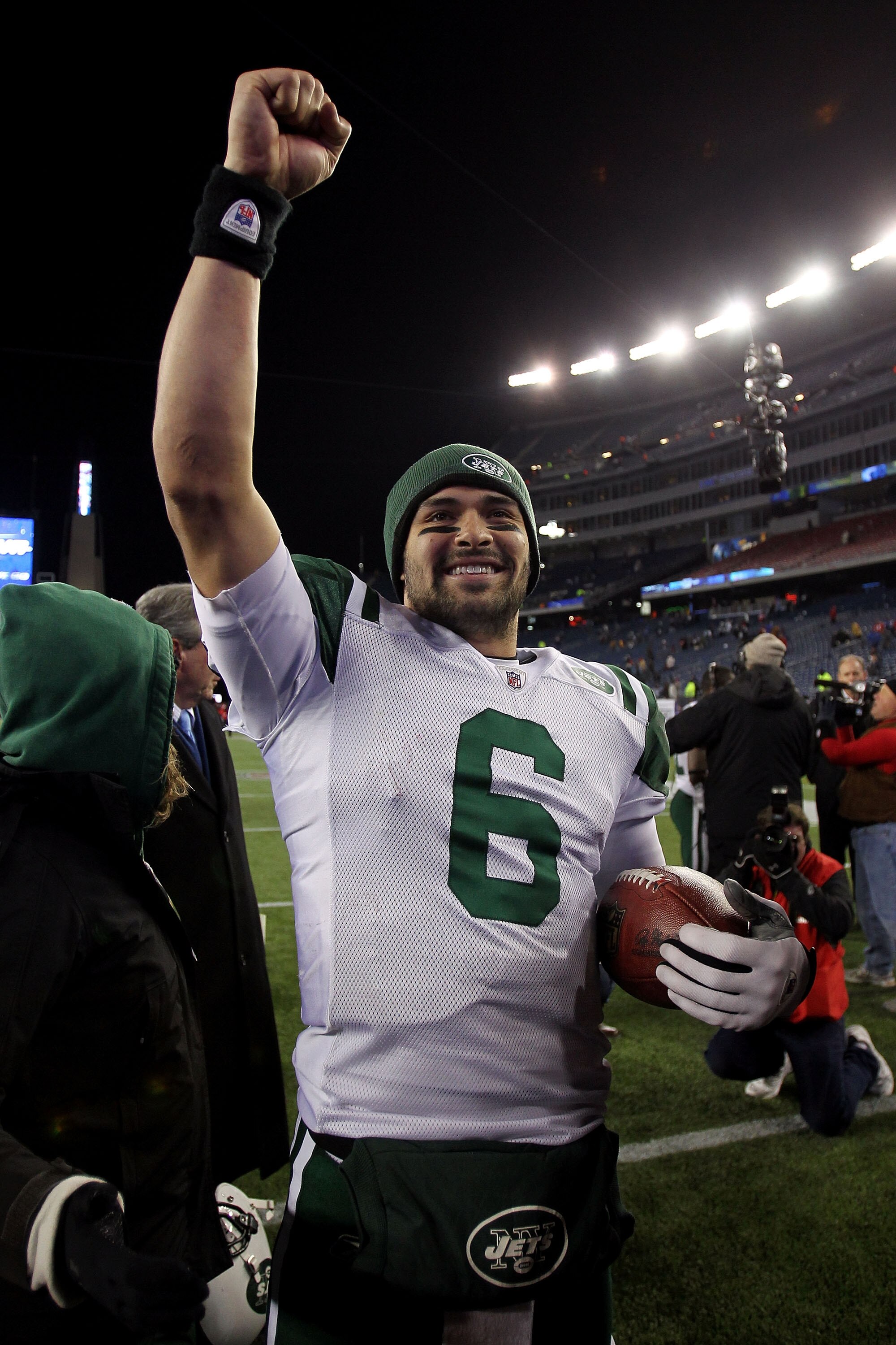 FOXBORO, MA - JANUARY 16:  Mark Sanchez #6 of the New York Jets celebrates after they defeated the Patriots 28 to 21 in their 2011 AFC divisional playoff game at Gillette Stadium on January 16, 2011 in Foxboro, Massachusetts.  (Photo by Jim Rogash/Getty I