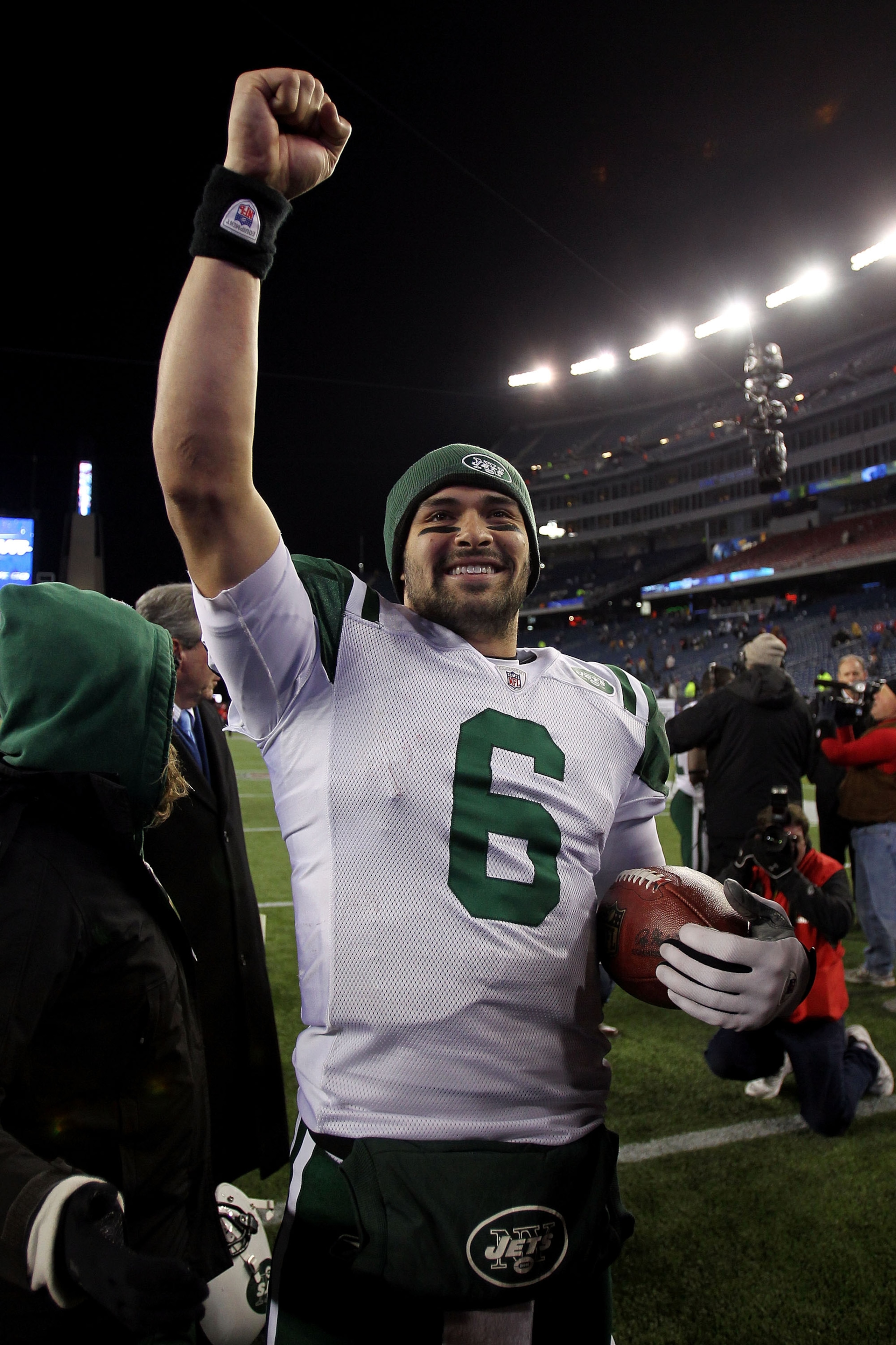 FOXBORO, MA - JANUARY 16:  Mark Sanchez #6 of the New York Jets celebrates after they defeated the Patriots 28 to 21 in their 2011 AFC divisional playoff game at Gillette Stadium on January 16, 2011 in Foxboro, Massachusetts.  (Photo by Jim Rogash/Getty I