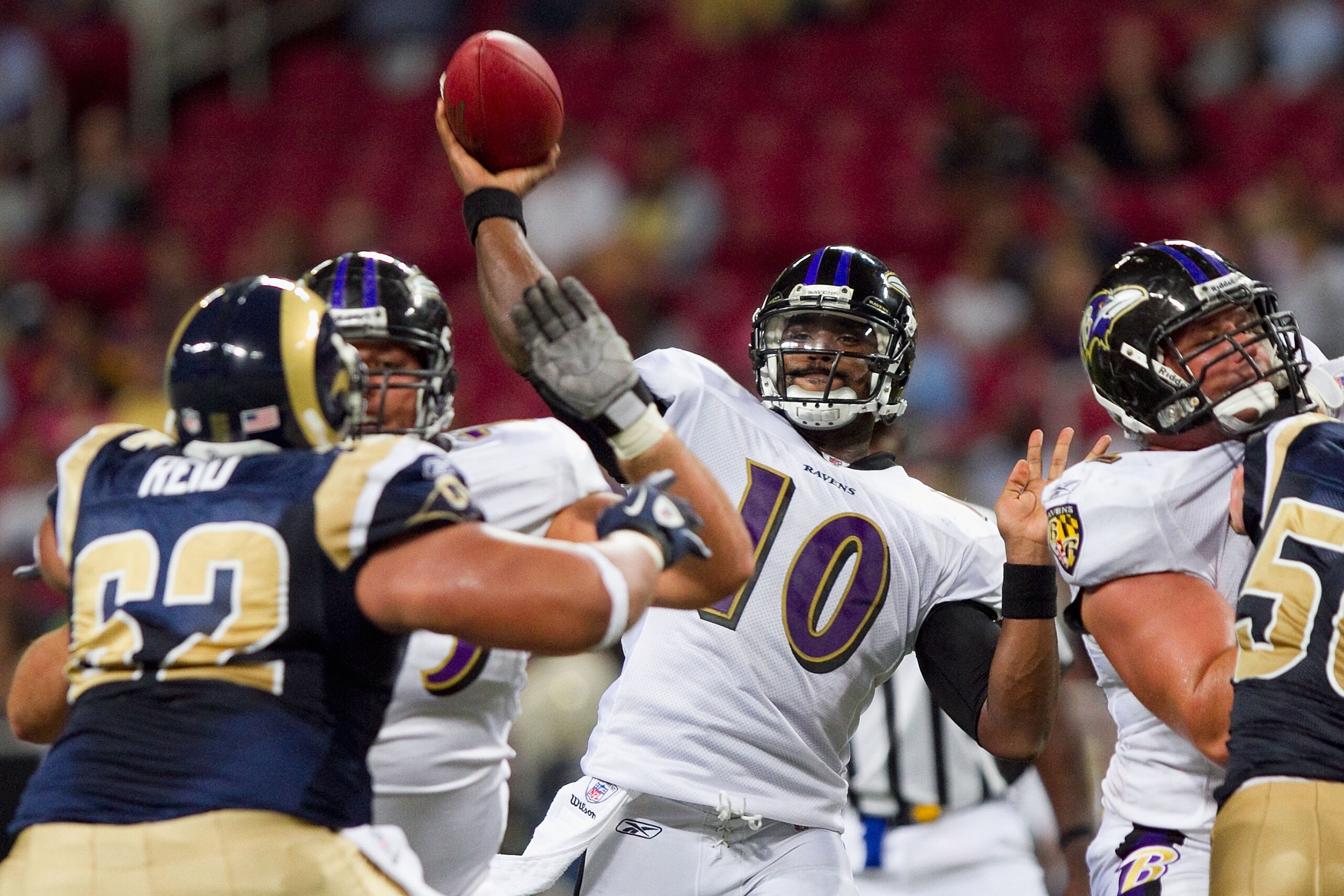 ST. LOUIS - SEPTEMBER 2: Troy Smith #10 of the Baltimore Ravens passes against the St. Louis Rams during an NFL preseason game at the Edward Jones Dome on September 2, 2010 in St. Louis, Missouri.  The Rams beat the Ravens 27-21.  (Photo by Dilip Vishwana