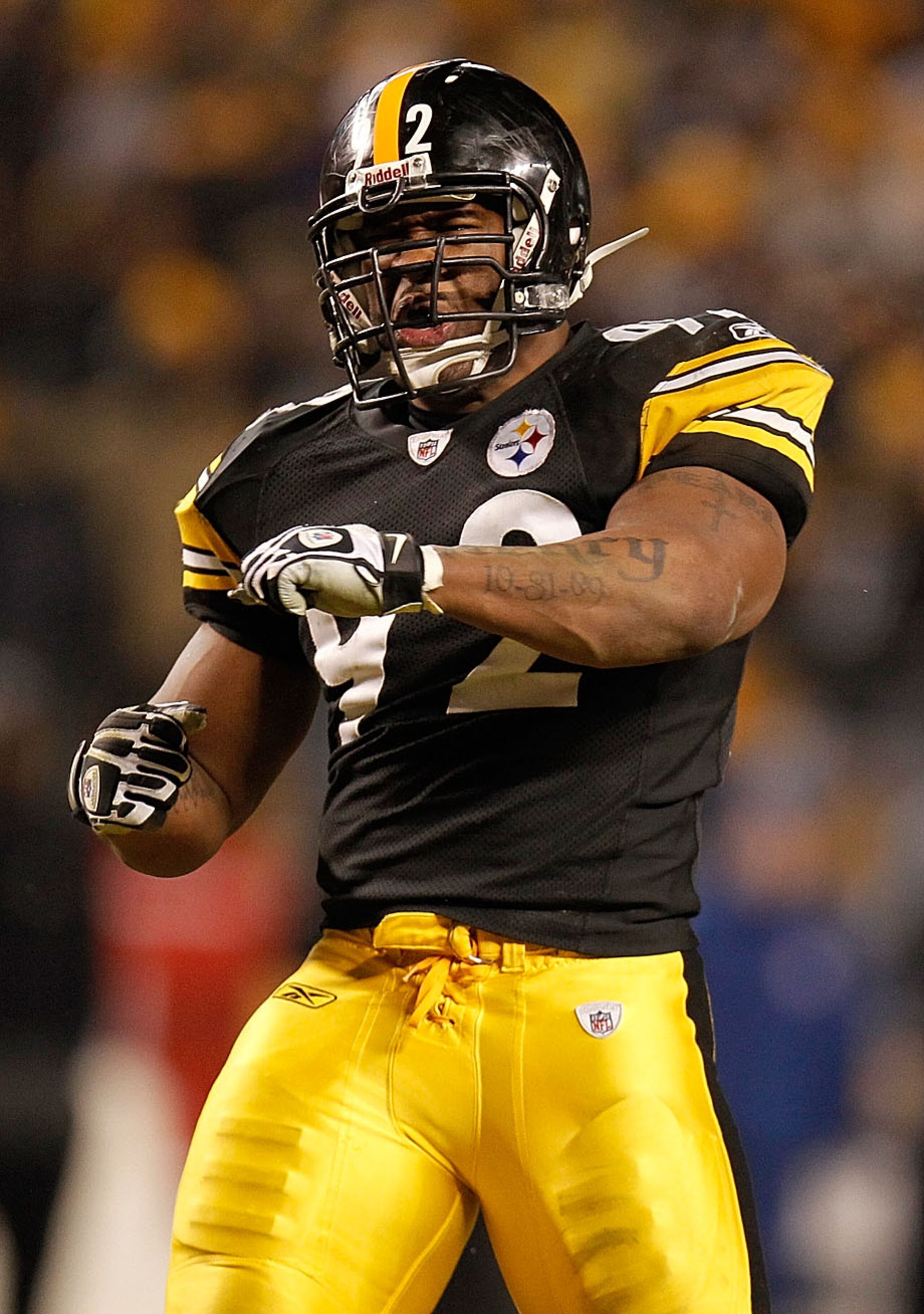 PITTSBURGH, PA - JANUARY 15:  Linebacker James Harrison #92 of the Pittsburgh Steelers celebrates after a play against the Baltimore Ravens during the AFC Divisional Playoff Game at Heinz Field on January 15, 2011 in Pittsburgh, Pennsylvania.  (Photo by G