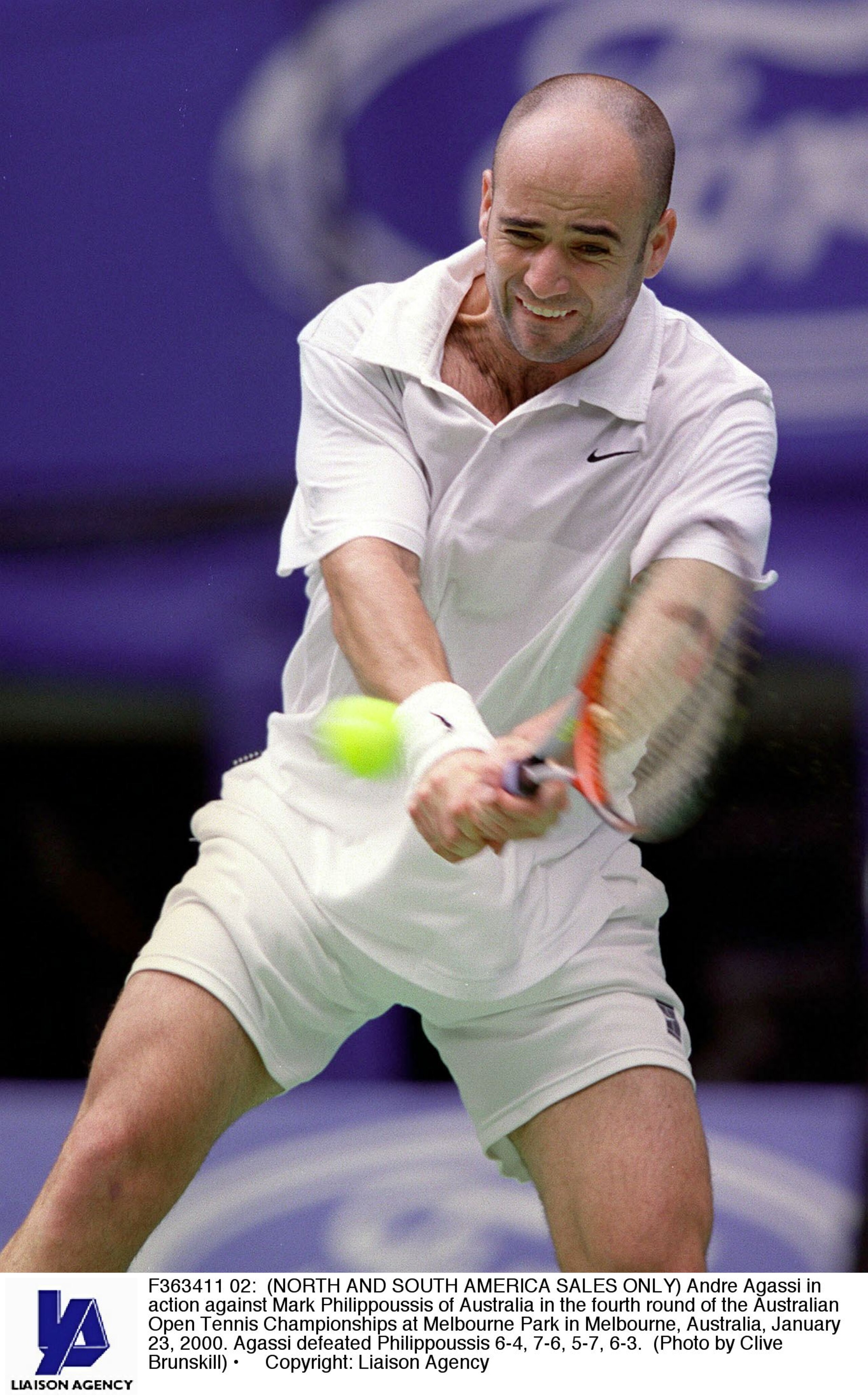F363411 02: (NORTH AND SOUTH AMERICA SALES ONLY) Andre Agassi in action against Mark Philippoussis of Australia in the fourth round of the Australian Open Tennis Championships at Melbourne Park in Melbourne, Australia, January 23, 2000. Agassi defeated Ph