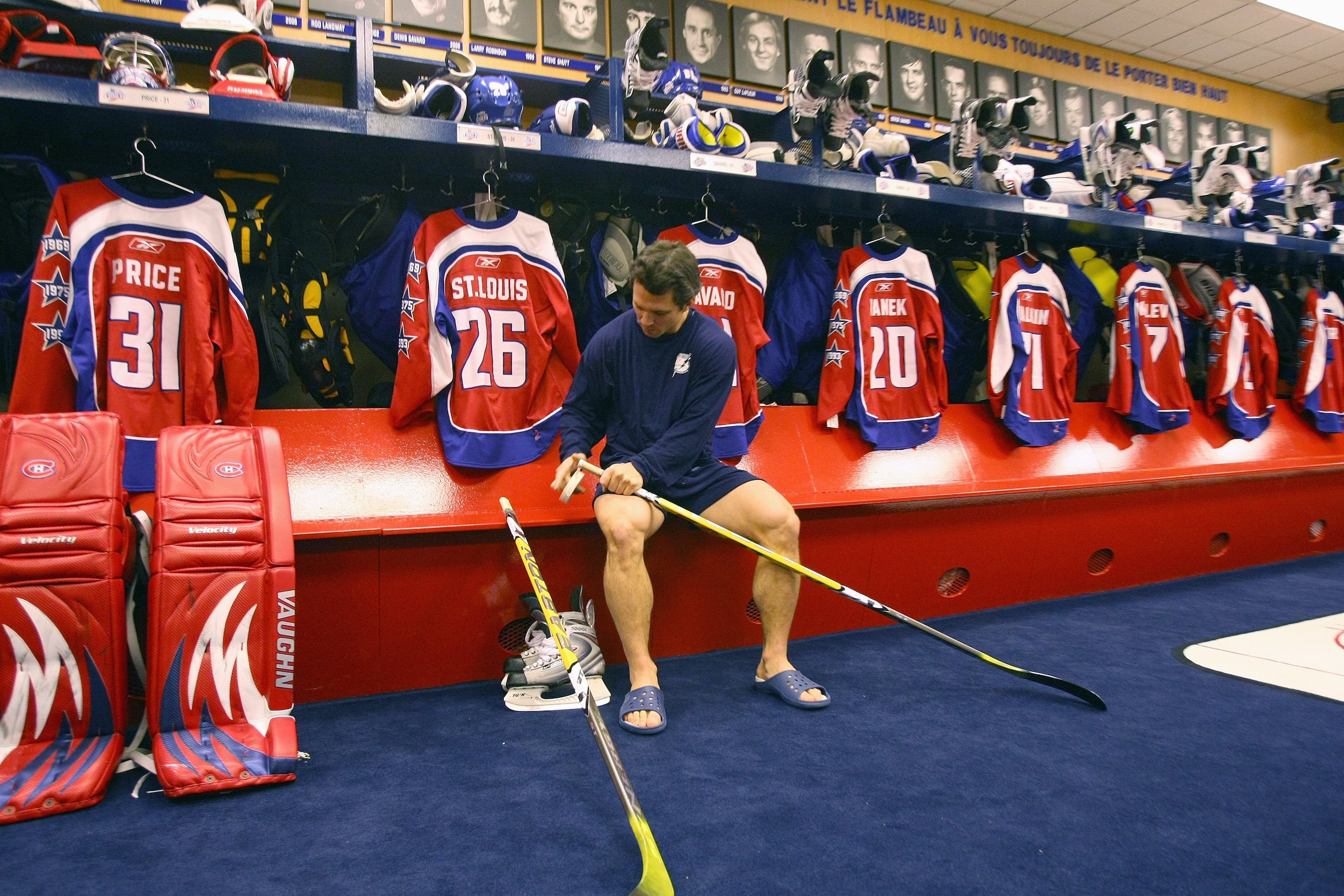 MONTREAL - JANUARY 25: Martin St. Louis of the Eastern Conference All-Stars gets prepared in the locker room before the 2009 NHL All-Star game at the Bell Centre on January 25, 2009 in Montreal, Canada. (Photo by Bruce Bennett/Getty Images) MONTREAL - JANUARY 25: Martin St. Louis of the Eastern Conference All-Stars gets prepared in the locker room before the 2009 NHL All-Star game at the Bell Centre on January 25, 2009 in Montreal, Canada. (Photo by Bruce Bennett/Getty Images)