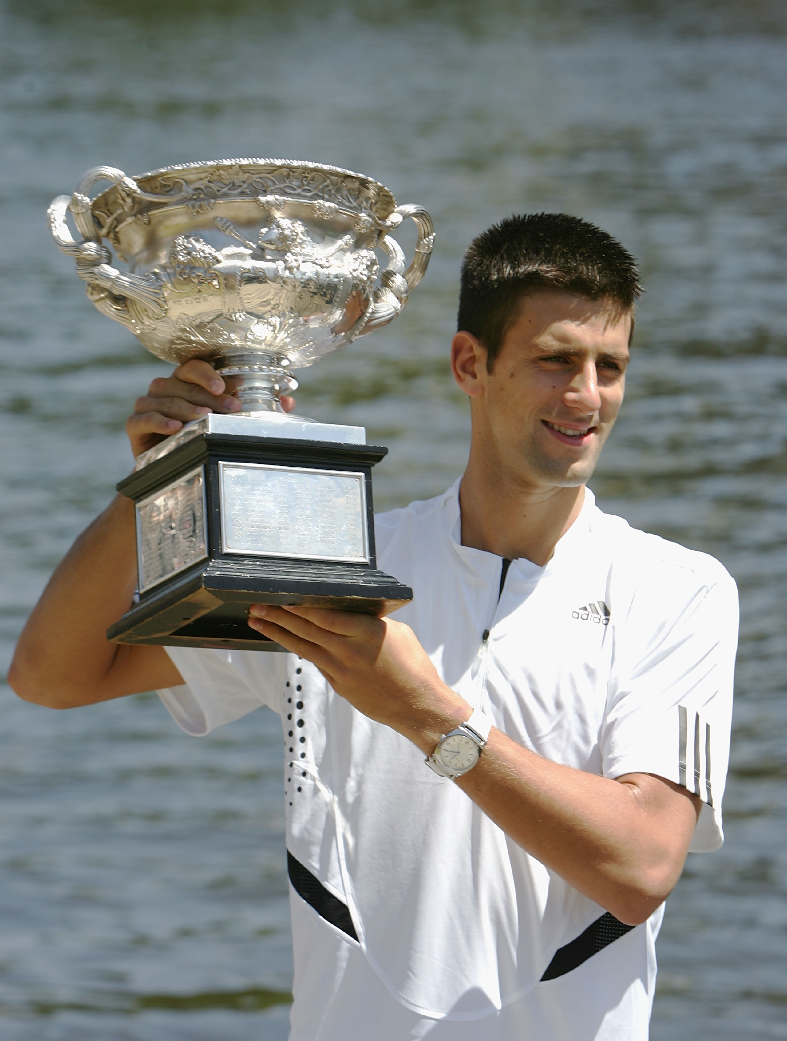 MELBOURNE, AUSTRALIA - JANUARY 28:  Novak Djokovic of Serbia poses with his trophy following his victory at the Men's Singles at the Australian Open 2008 January 28, 2008 in Melbourne, Australia.  (Photo by James Knowler/Getty Images)