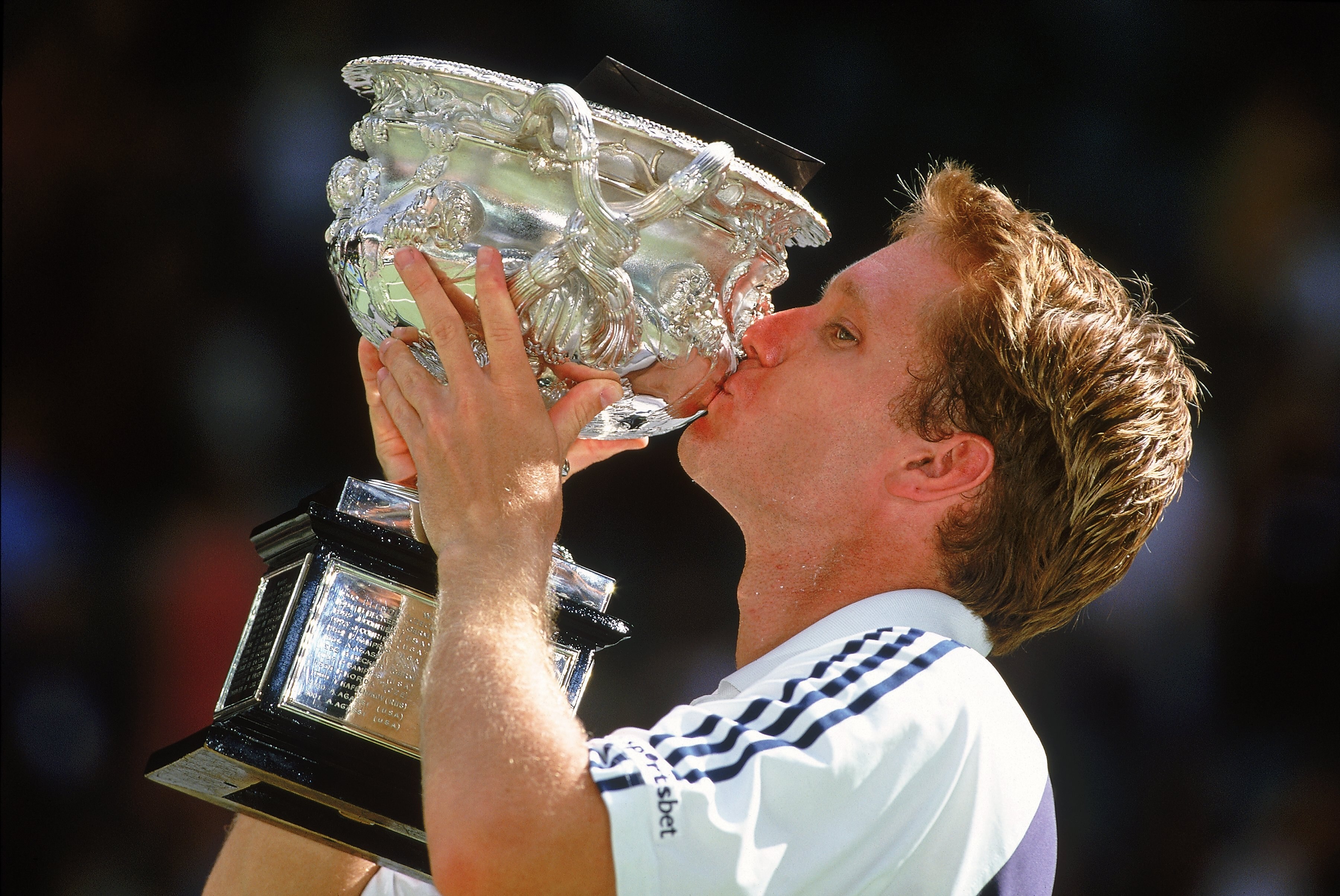27 Jan 2002:  Thomas Johansson of Sweden poses with the winning trophy after winning the Australian Open Final held at Melbourne Park, in Melbourne, Australia. \ Mandatory Credit: Adam Pretty /Allsport