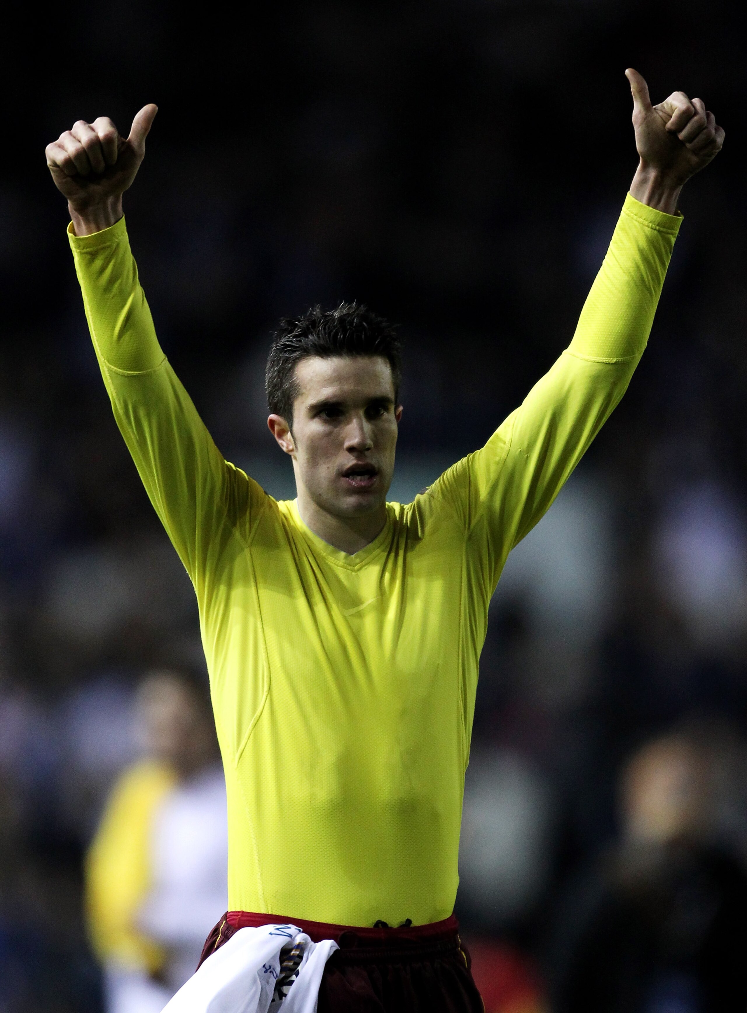 LEEDS, ENGLAND - JANUARY 19:  Robin van Persie of Arsenal salutes the fans at the end of the FA Cup sponsored by E.On Third Round Replay match between Leeds United and Arsenal at Elland Road on January 19, 2011 in Leeds, England.  (Photo by Alex Livesey/G