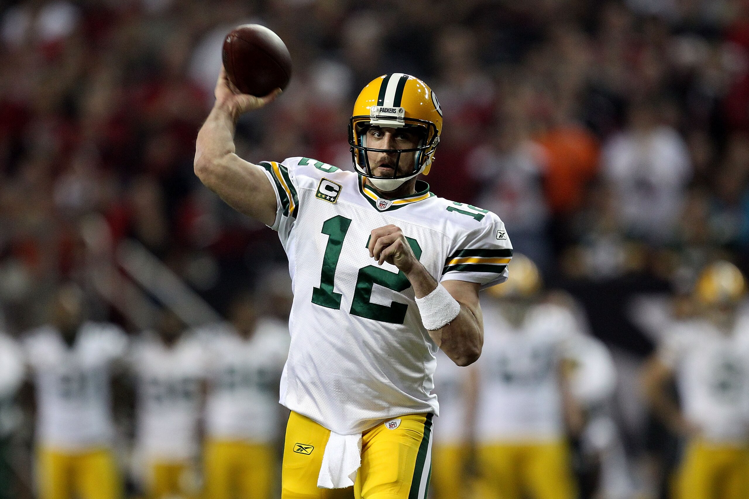 ATLANTA, GA - JANUARY 15:  Aaron Rodgers #12 of the Green Bay Packers throws a 6-yard touchdown to Jordy Nelson #87 in the seocnd quarter against the Atlanta Falcons during their 2011 NFC divisional playoff game at Georgia Dome on January 15, 2011 in Atla