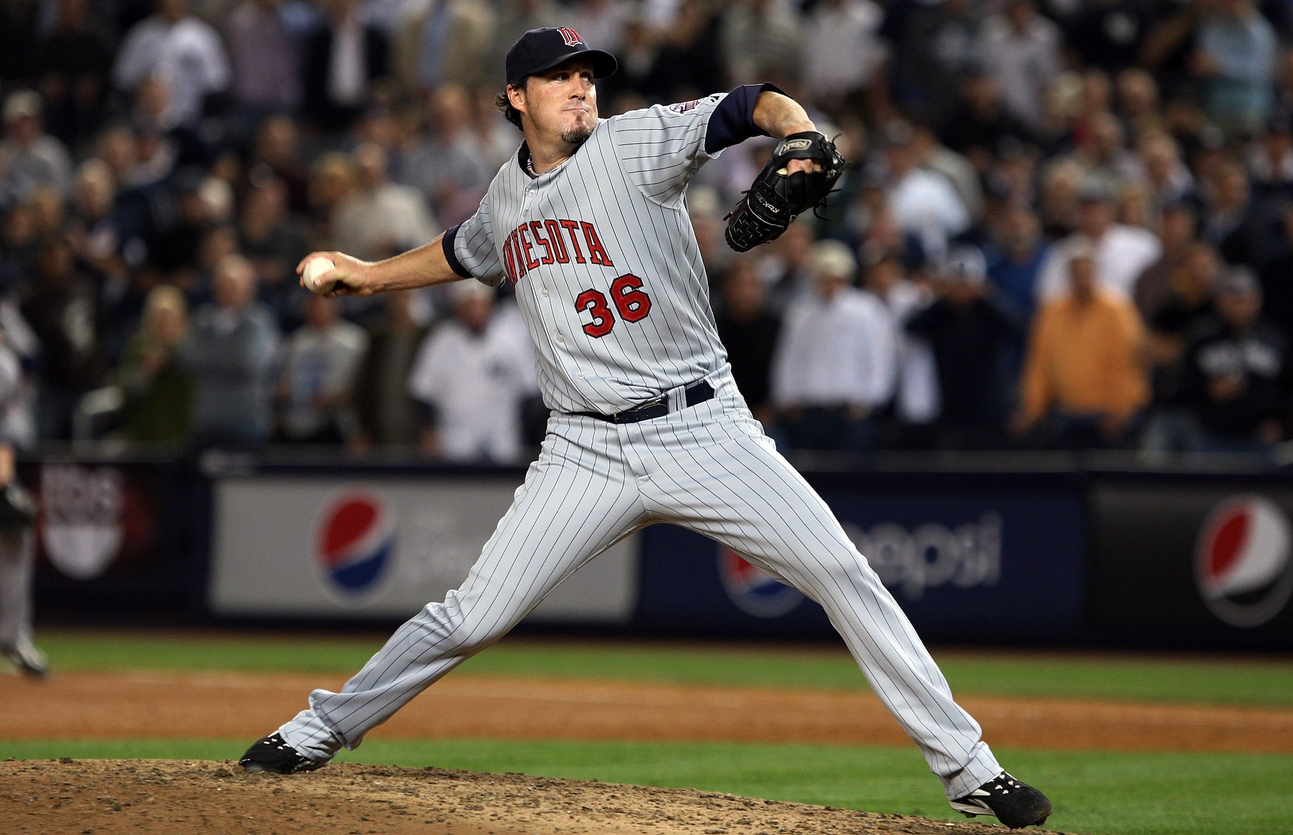 NEW YORK - OCTOBER 09: Joe Nathan #36 of the Minnesota Twins pitches against the New York Yankees in Game Two of the ALDS during the 2009 MLB Playoffs at Yankee Stadium on October 9, 2009 in the Bronx borough of New York City. (Photo by Jim McIsaac/Getty NEW YORK - OCTOBER 09: Joe Nathan #36 of the Minnesota Twins pitches against the New York Yankees in Game Two of the ALDS during the 2009 MLB Playoffs at Yankee Stadium on October 9, 2009 in the Bronx borough of New York City. (Photo by Jim McIsaac/Getty