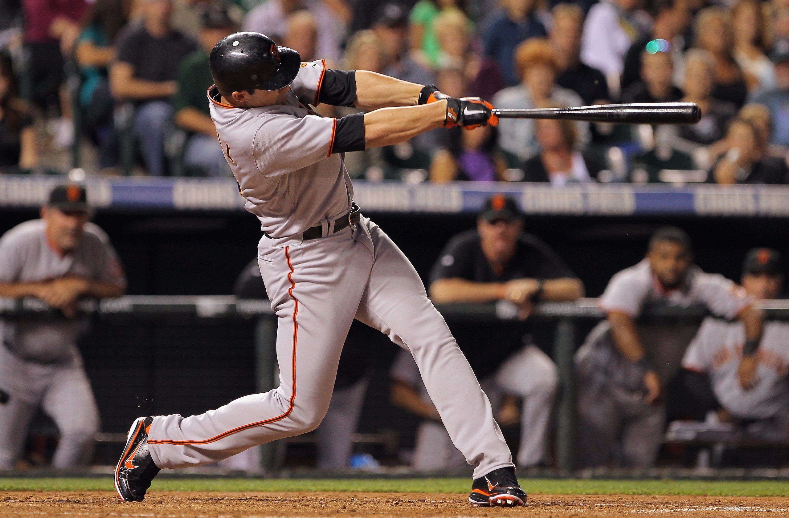 DENVER - SEPTEMBER 24: Pat Burrell #9 of the San Francisco Giants follows through on his game winning two run home run off of starting pitcher Jhoulys Chacin #45 of the Colorado Rockies in the seventh inning at Coors Field on September 24, 2010 in Denver DENVER - SEPTEMBER 24: Pat Burrell #9 of the San Francisco Giants follows through on his game winning two run home run off of starting pitcher Jhoulys Chacin #45 of the Colorado Rockies in the seventh inning at Coors Field on September 24, 2010 in Denver