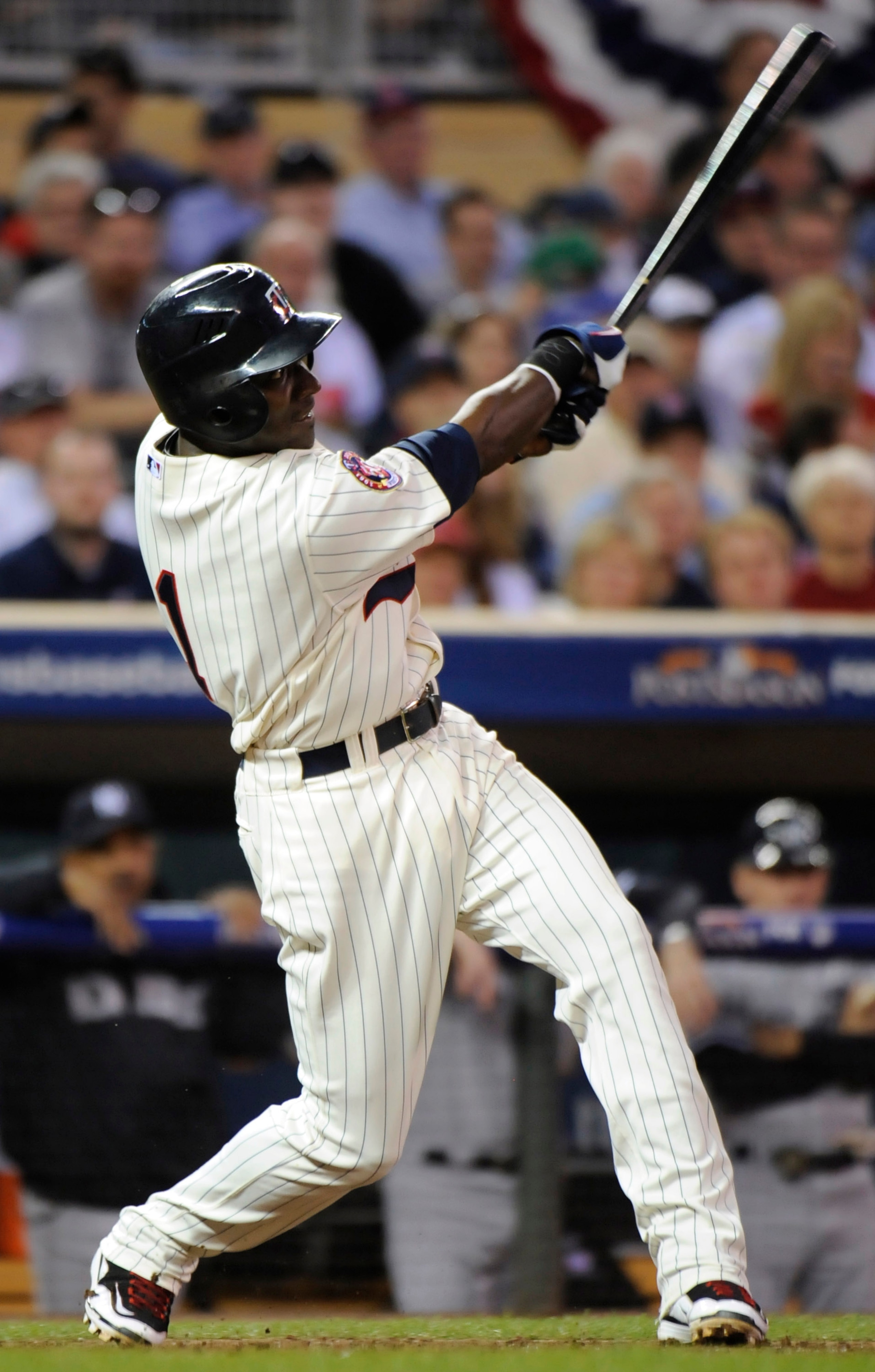 MINNEAPOLIS, MN - OCTOBER 7: Orlando Hudson #1 of the Minnesota Twins hits a solo home run in the sixth inning during game two of the ALDS game against the New York Yankees on October 7, 2010 at Target Field in Minneapolis, Minnesota. (Photo by Hannah Fo MINNEAPOLIS, MN - OCTOBER 7: Orlando Hudson #1 of the Minnesota Twins hits a solo home run in the sixth inning during game two of the ALDS game against the New York Yankees on October 7, 2010 at Target Field in Minneapolis, Minnesota. (Photo by Hannah Fo