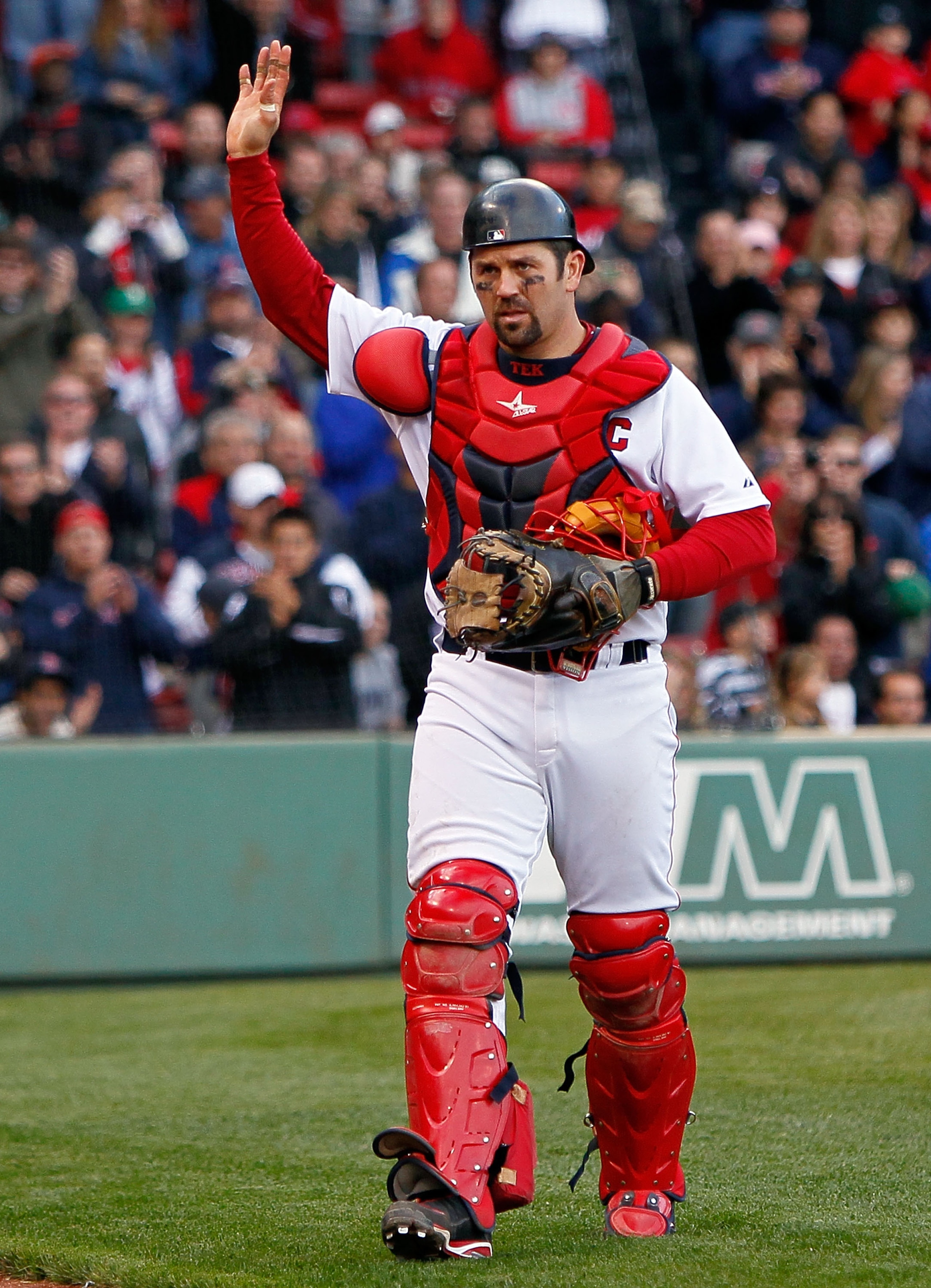 BOSTON - OCTOBER 3: Jason Varitek #33 of the Boston Red Sox reacts to fan applause as he leaves the field for a replacement in the ninth inning against the New York Yankees at Fenway Park, October 3, 2010, in Boston, Massachusetts. The Red Sox won 8-4. BOSTON - OCTOBER 3: Jason Varitek #33 of the Boston Red Sox reacts to fan applause as he leaves the field for a replacement in the ninth inning against the New York Yankees at Fenway Park, October 3, 2010, in Boston, Massachusetts. The Red Sox won 8-4.