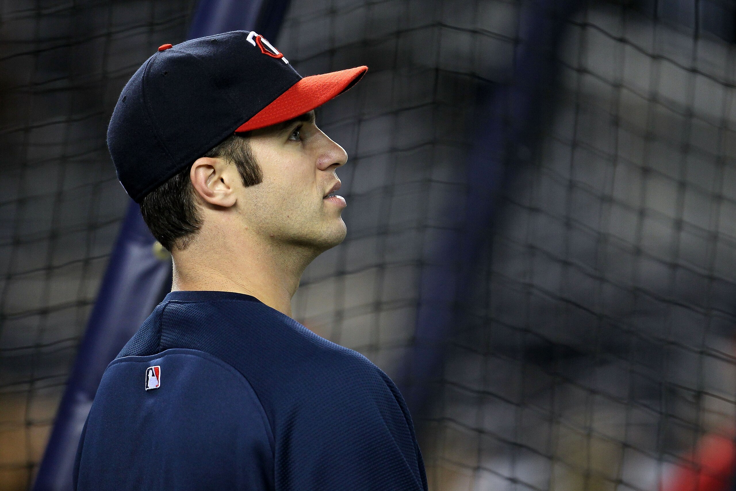 NEW YORK - OCTOBER 09: Joe Mauer #7 of the Minnesota Twins looks on during batting practice against the New York Yankees during Game Three of the ALDS part of the 2010 MLB Playoffs at Yankee Stadium on October 9, 2010 in the Bronx borough of New York Cit NEW YORK - OCTOBER 09: Joe Mauer #7 of the Minnesota Twins looks on during batting practice against the New York Yankees during Game Three of the ALDS part of the 2010 MLB Playoffs at Yankee Stadium on October 9, 2010 in the Bronx borough of New York Cit