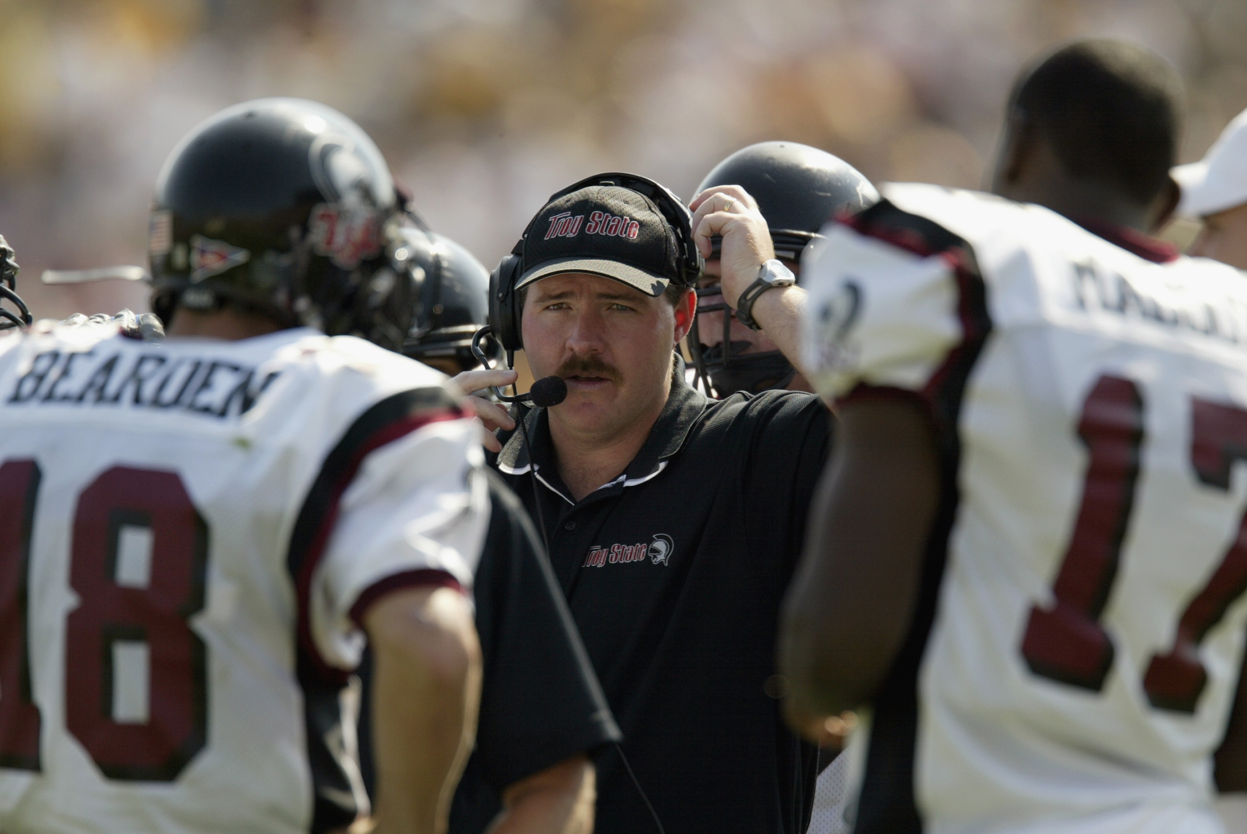 COLUMBIA, MO - SEPTEMBER 28:  Offensive line coach Greg Adkins of the Troy State Trojans stands on the sideline during the NCAA football game against the Missouri Tigers on September 28, 2002 at Faurot Field in Columbia, Missouri.  Missouri won 44-7. (Pho