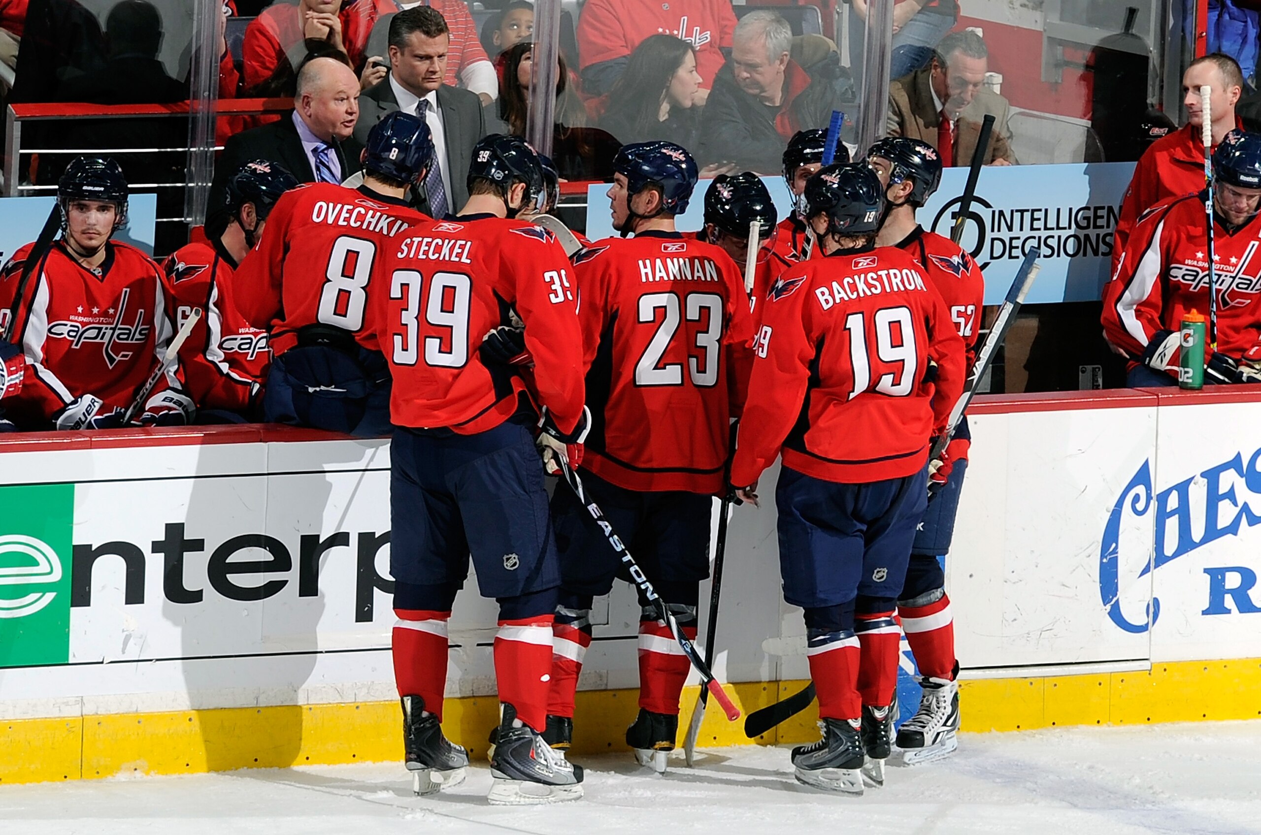 WASHINGTON - JANUARY 08:  Head coach Bruce Boudreau of the Washington Capitals talks to his team during a timeout in the game against the Florida Panthers at the Verizon Center on January 8, 2011 in Washington, DC.  (Photo by Greg Fiume/Getty Images)