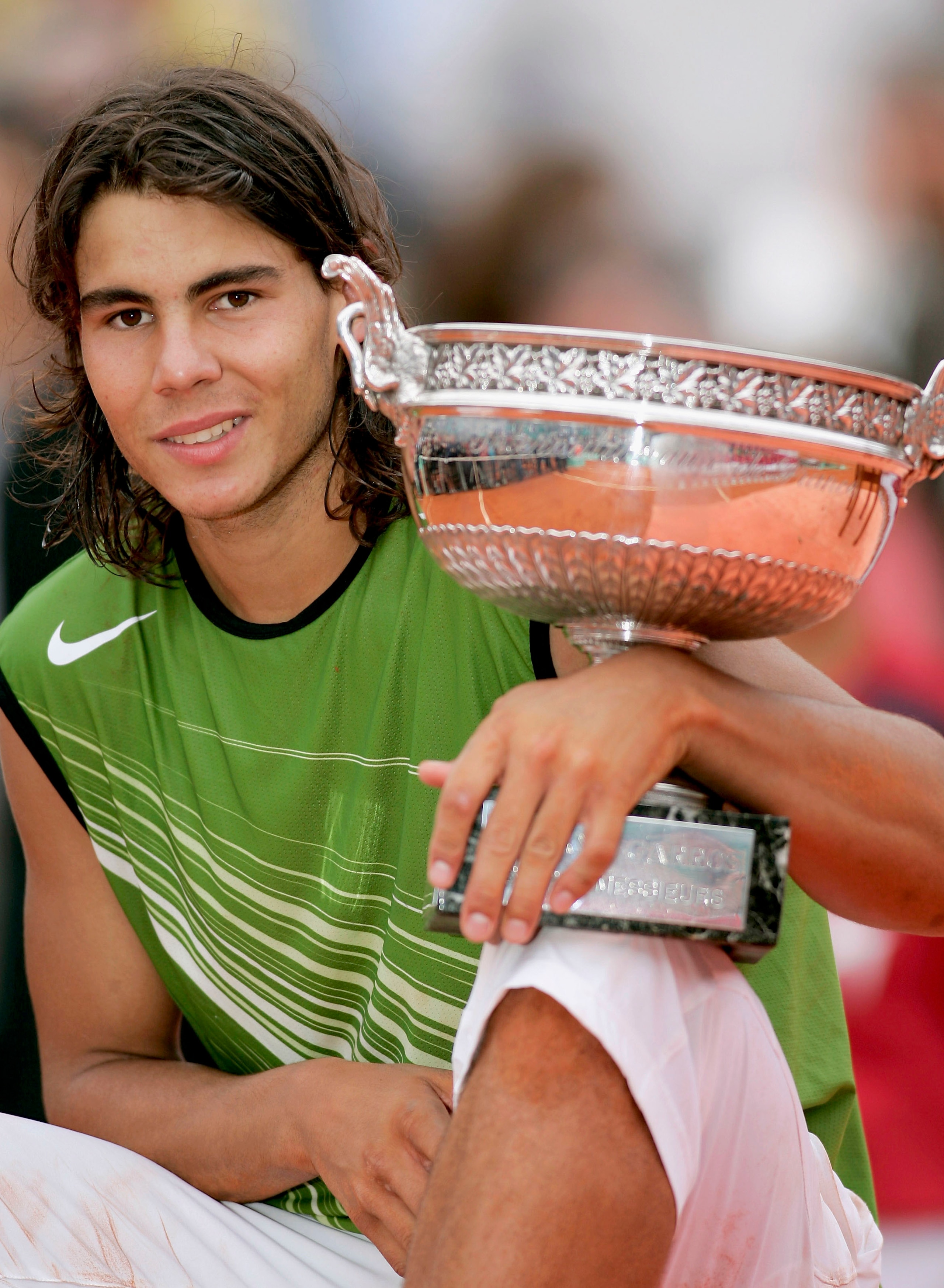 PARIS - JUNE 05:  Rafael Nadal of Spain poses with the winners trophy after his 3-1 sets victory over Mariano Puerta of Argentina during the Mens Final match during the fourteenth day of the French Open at Roland Garros on June 5, 2005 in Paris, France.