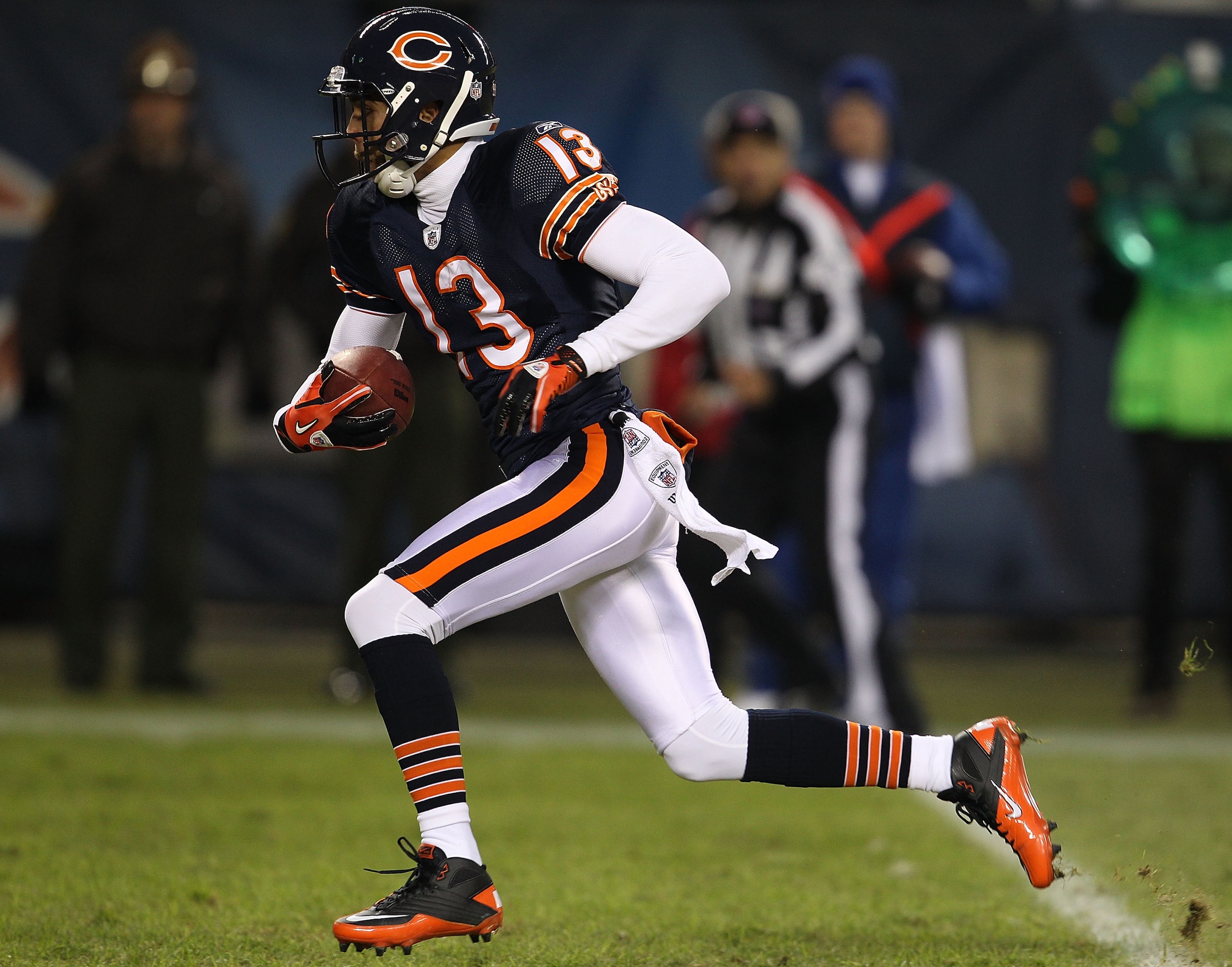 CHICAGO - NOVEMBER 28: Johnny Knox #13 of the Chicago Bears runs for a first down against the Philadelphia Eagles at Soldier Field on November 28, 2010 in Chicago, Illinois. The Bears defeated the Eagles 31-26. (Photo by Jonathan Daniel/Getty Images)
