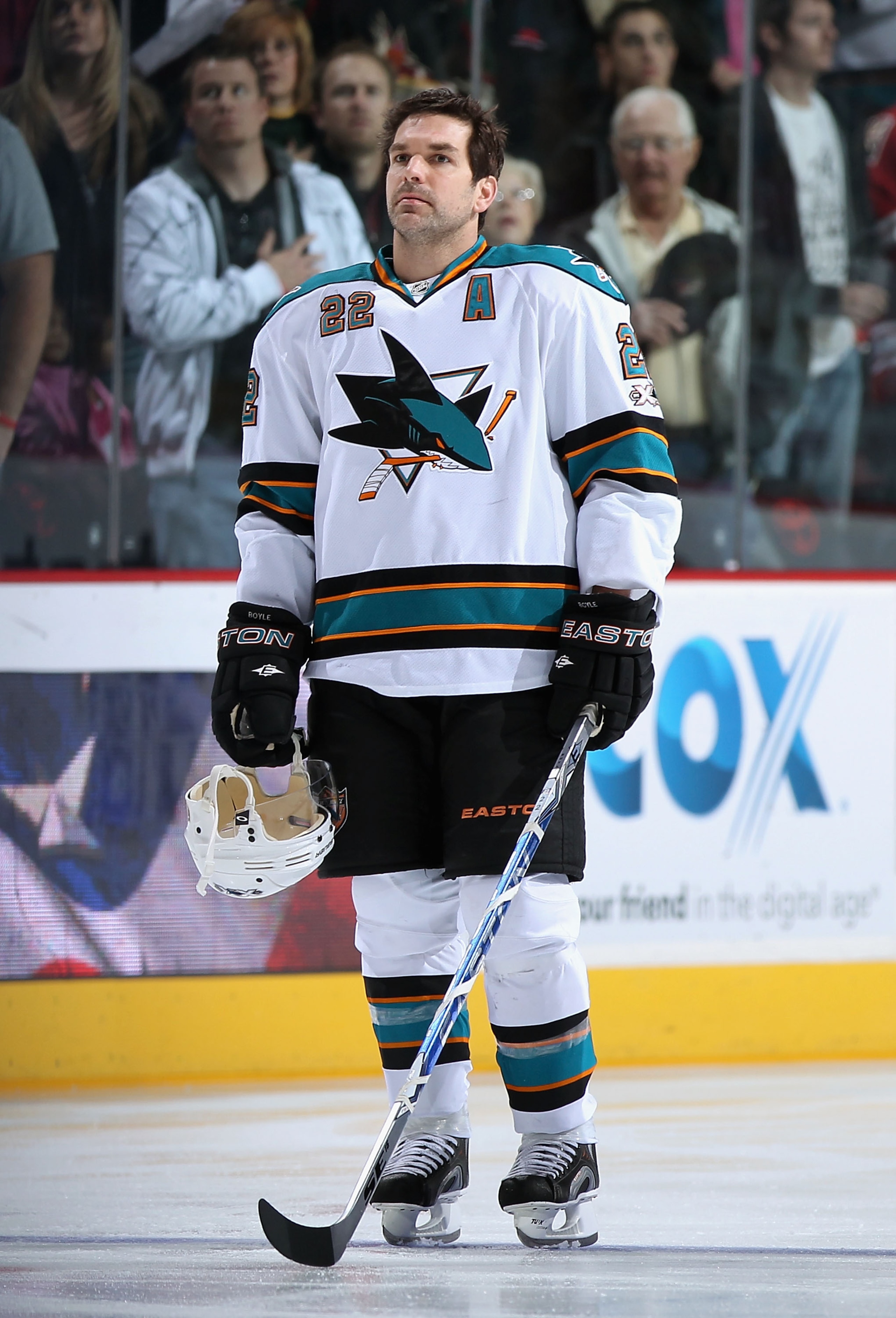 GLENDALE, AZ - JANUARY 17:  Dan Boyle #22 of the San Jose Sharks stands attended before the NHL game against the Phoenix Coyotes at Jobing.com Arena on January 17, 2011 in Glendale, Arizona.  The Sharks defeated the Coyotes 4-2.  (Photo by Christian Peter
