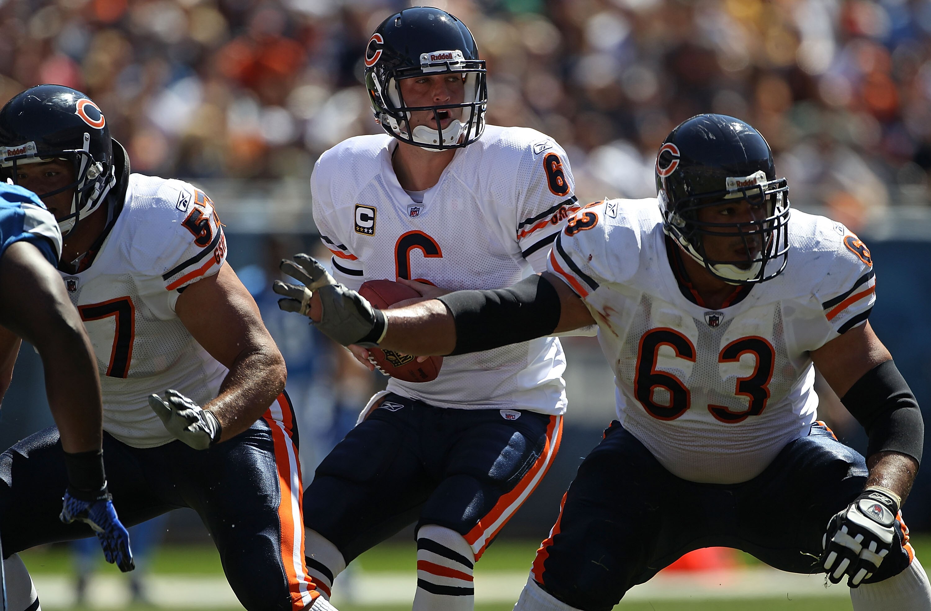 CHICAGO - SEPTEMBER 12: Jay Cutler #6 of the Chicago Bears drops back to pass under the protection of teammates Roberto Garza #63 and Olin Kreutz #57 against the Detroit Lions during the NFL season opening game at Soldier Field on September 12, 2010 in Ch