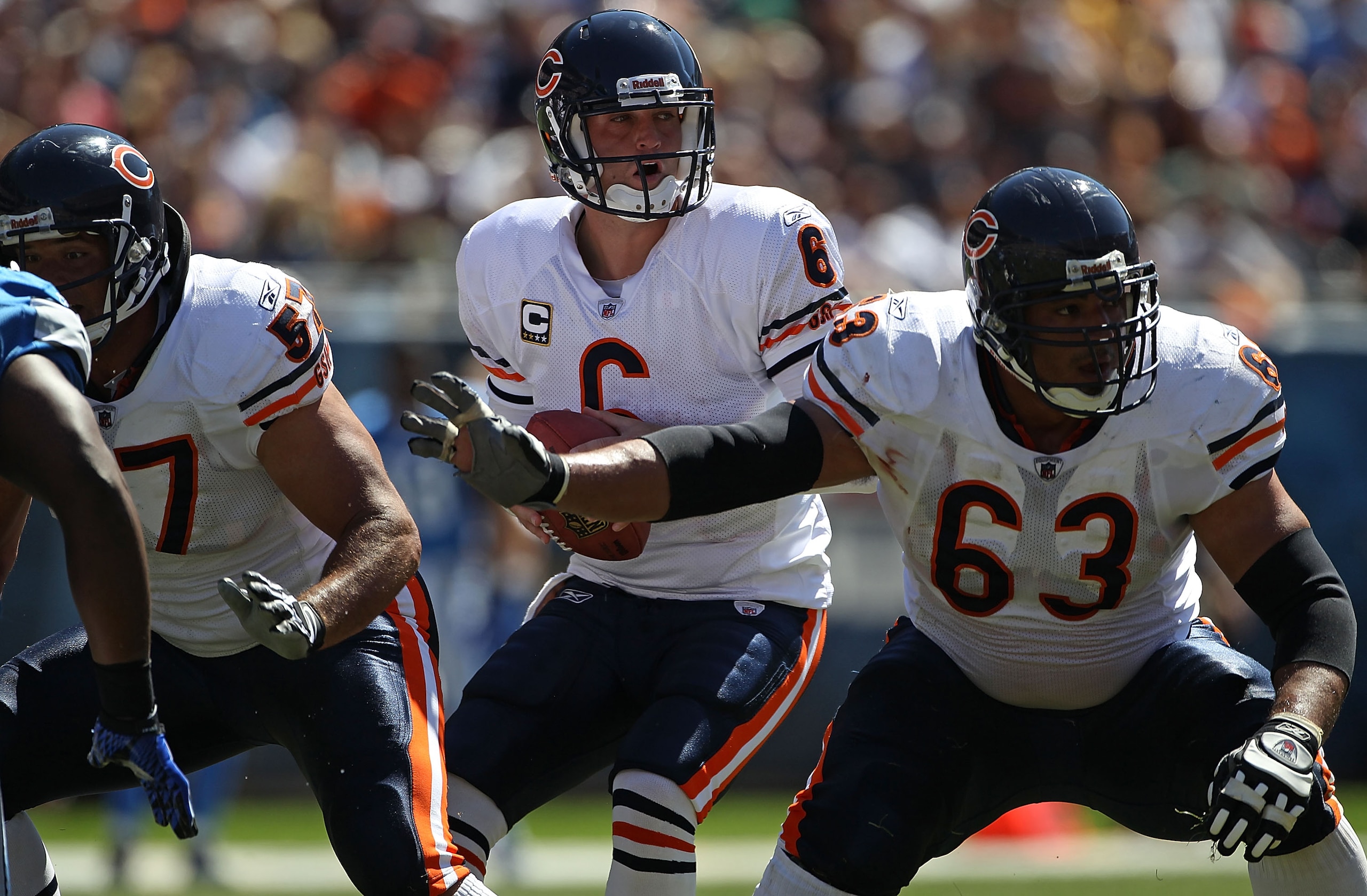 CHICAGO - SEPTEMBER 12: Jay Cutler #6 of the Chicago Bears drops back to pass under the protection of teammates Roberto Garza #63 and Olin Kreutz #57 against the Detroit Lions during the NFL season opening game at Soldier Field on September 12, 2010 in Ch
