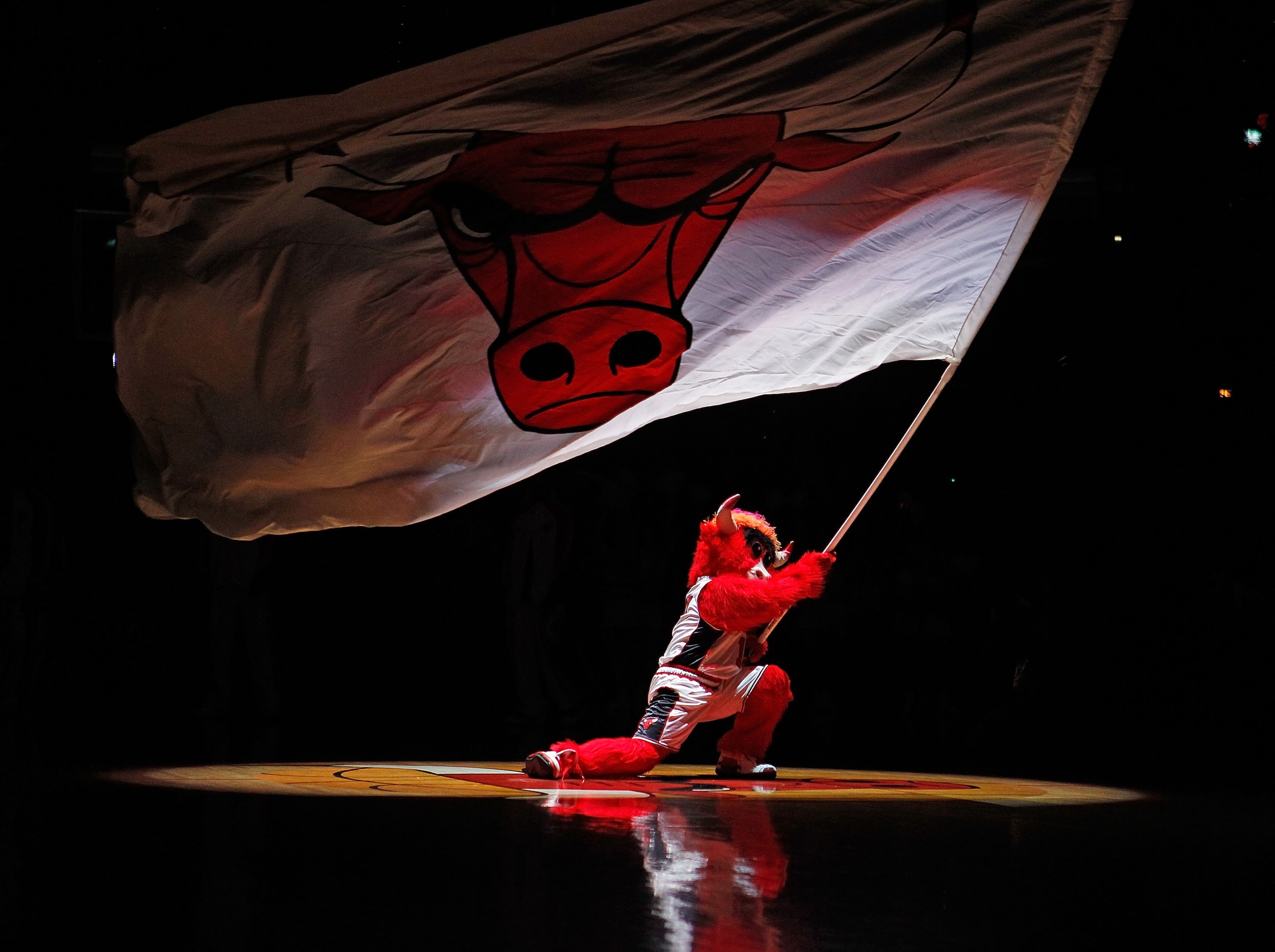 CHICAGO - MARCH 01: Benny, mascot of the Chicago Bulls, waves a flag during player introductions before a game between the Bulls and the Atlanta Hawks at the United Center on March 1, 2010 in Chicago, Illinois. NOTE TO USER: User expressly acknowledges an CHICAGO - MARCH 01: Benny, mascot of the Chicago Bulls, waves a flag during player introductions before a game between the Bulls and the Atlanta Hawks at the United Center on March 1, 2010 in Chicago, Illinois. NOTE TO USER: User expressly acknowledges an