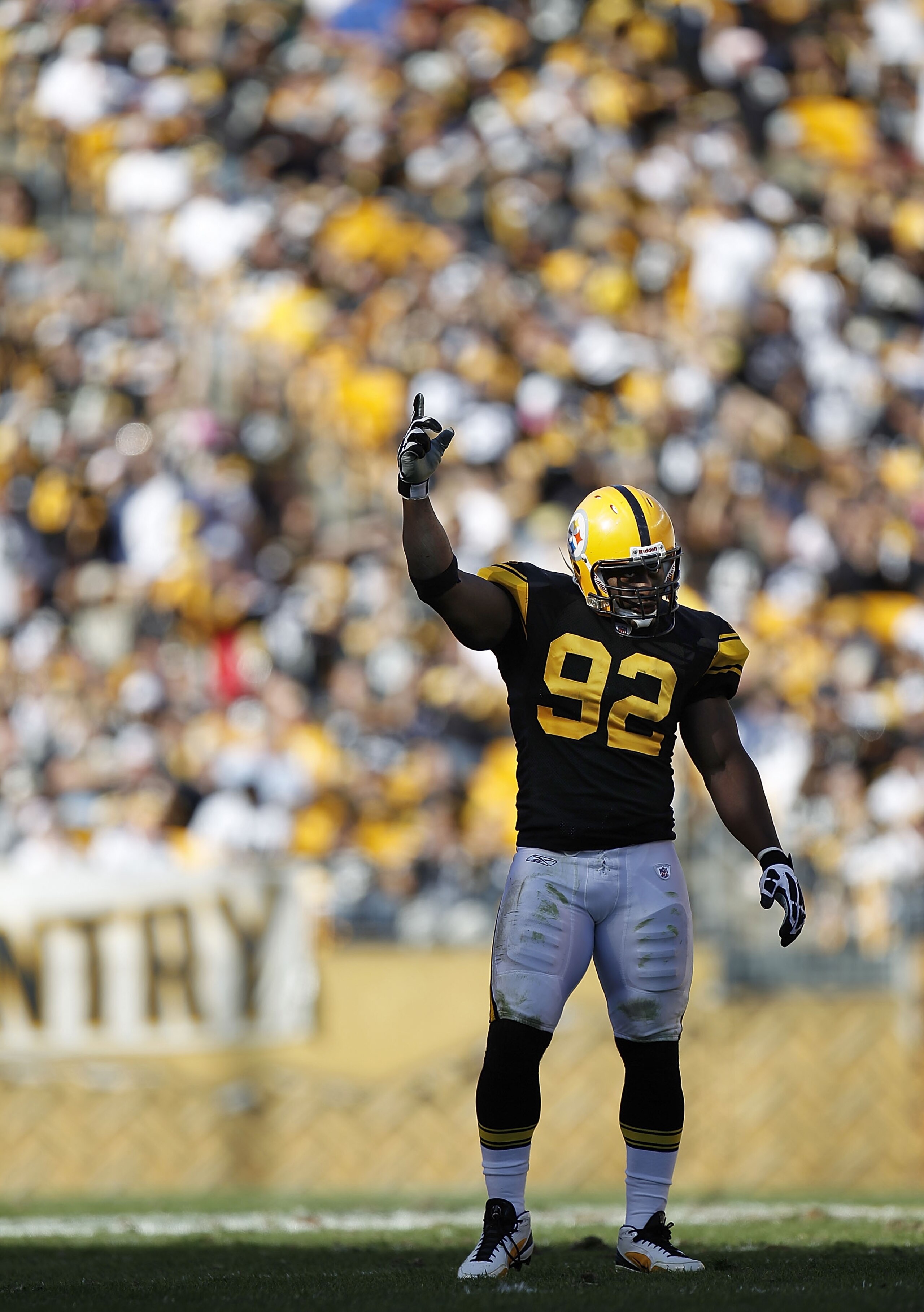 PITTSBURGH - OCTOBER 17:  James Harrison #92 of the Pittsburgh Steelers encourages the fans to make noise while playing the Cleveland Browns on October 17, 2010 at Heinz Field in Pittsburgh, Pennsylvania. Pittsburgh won the game 28-10.  (Photo by Gregory