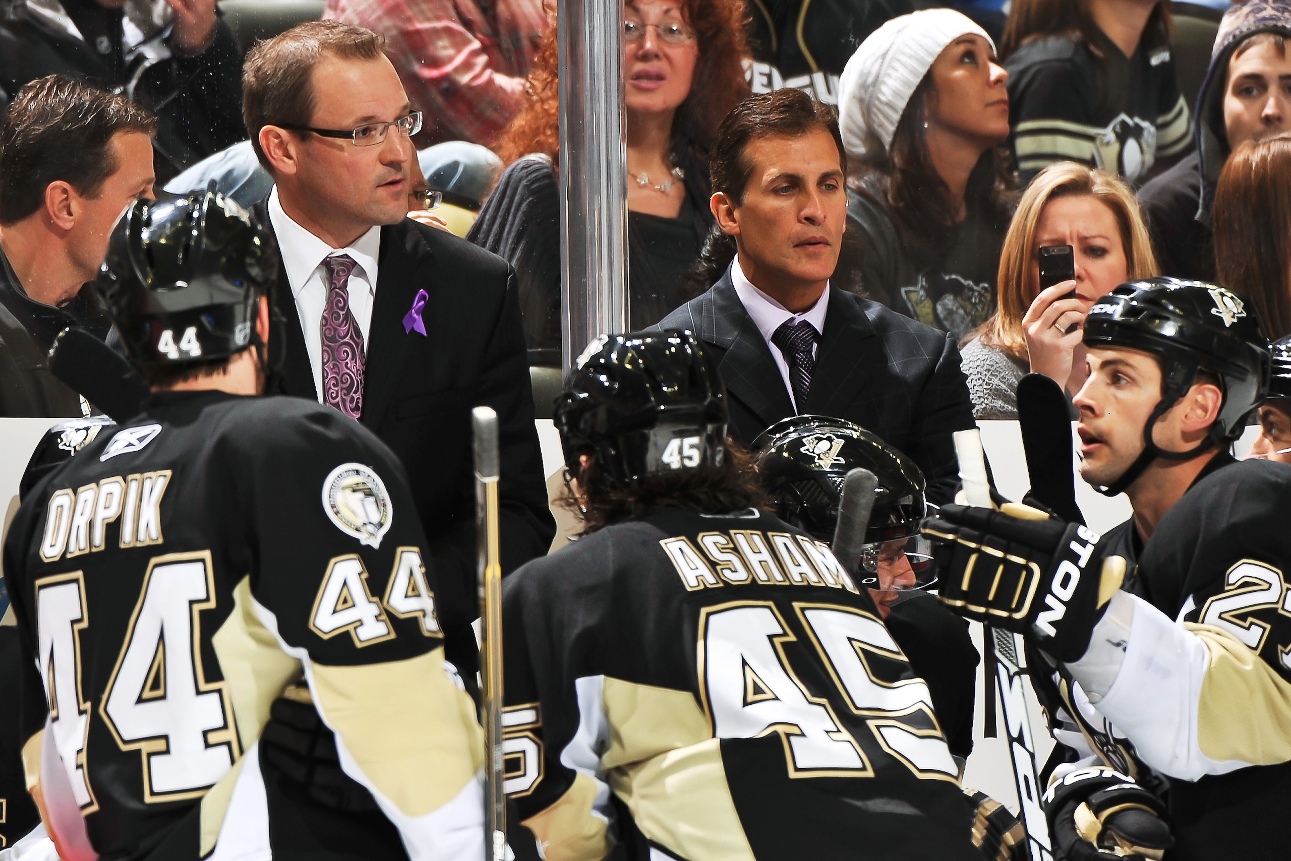 PITTSBURGH - NOVEMBER 19:  Head Coach Dan Bylsma and assistant coach Tony Granato of the Pittsburgh Penguins address the team during a timeout against the Carolina Hurricanes on November 19, 2010 at Consol Energy Center in Pittsburgh, Pennsylvania.  (Phot