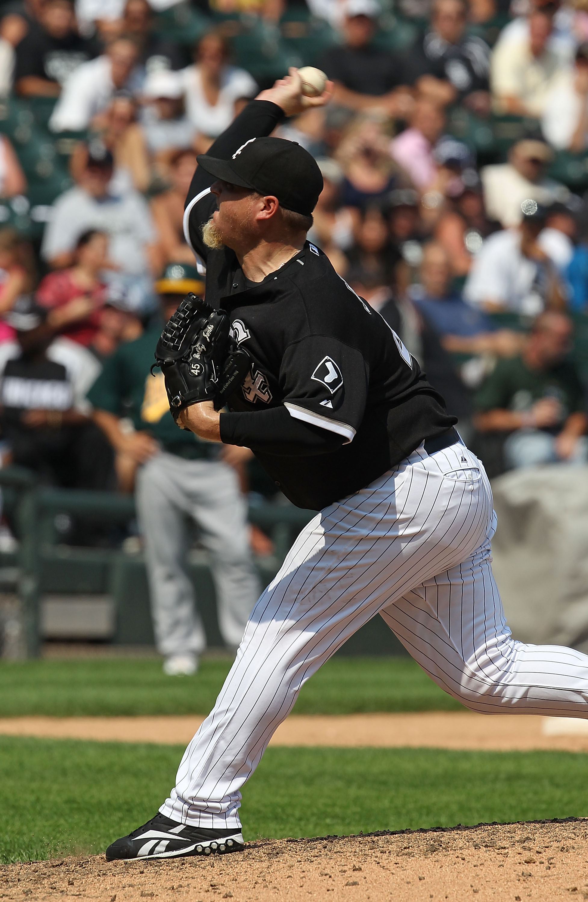 Chicago White Sox closer Bobby Jenks reacts after striking out