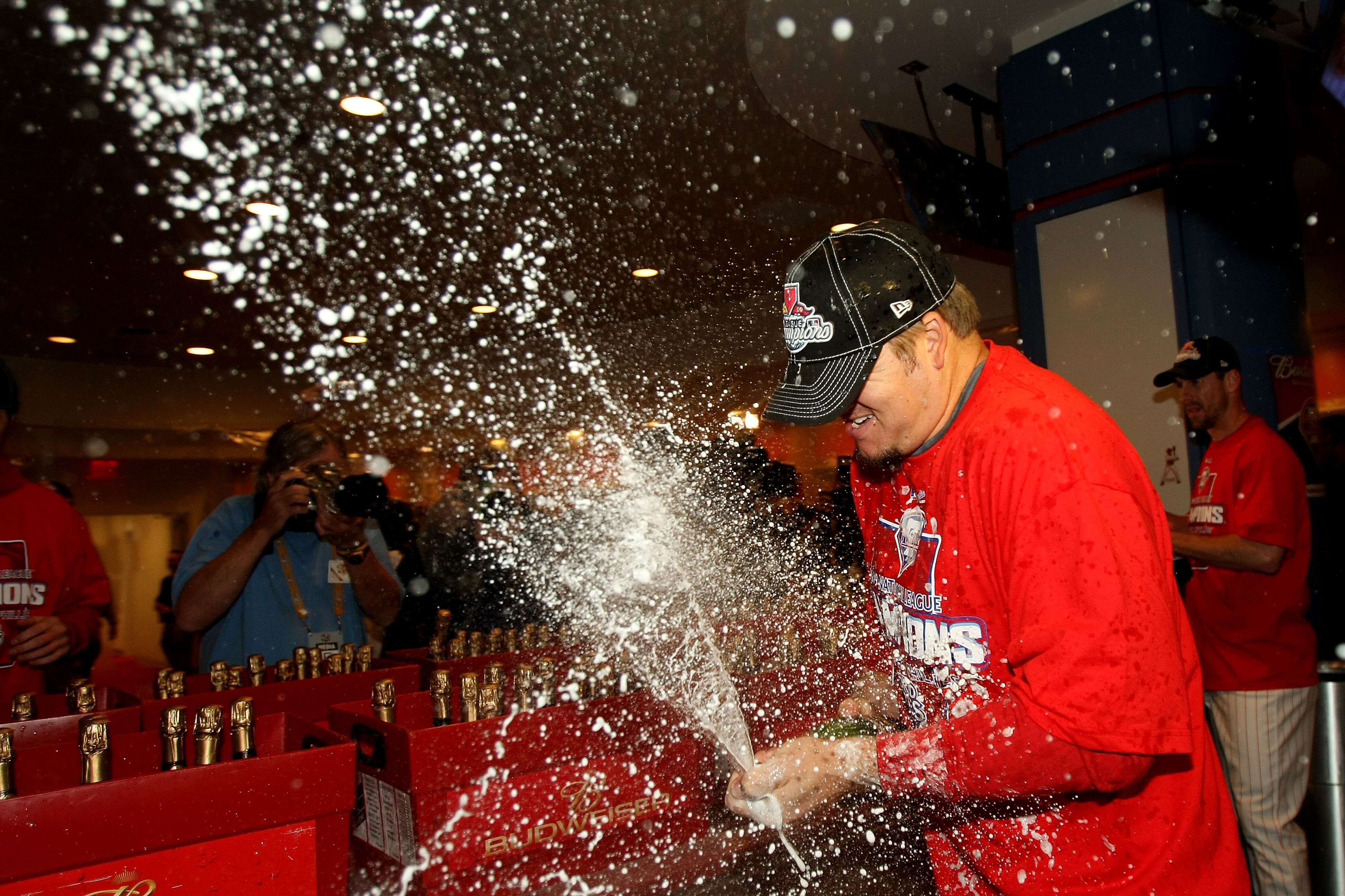 PHILADELPHIA - OCTOBER 21:  Joe Blanton #56 of the Philadelphia Phillies sprays champagne as they celebrate defeating the Los Angeles Dodgers 10-4 to advance to the World Series in Game Five of the NLCS during the 2009 MLB Playoffs at Citizens Bank Park o