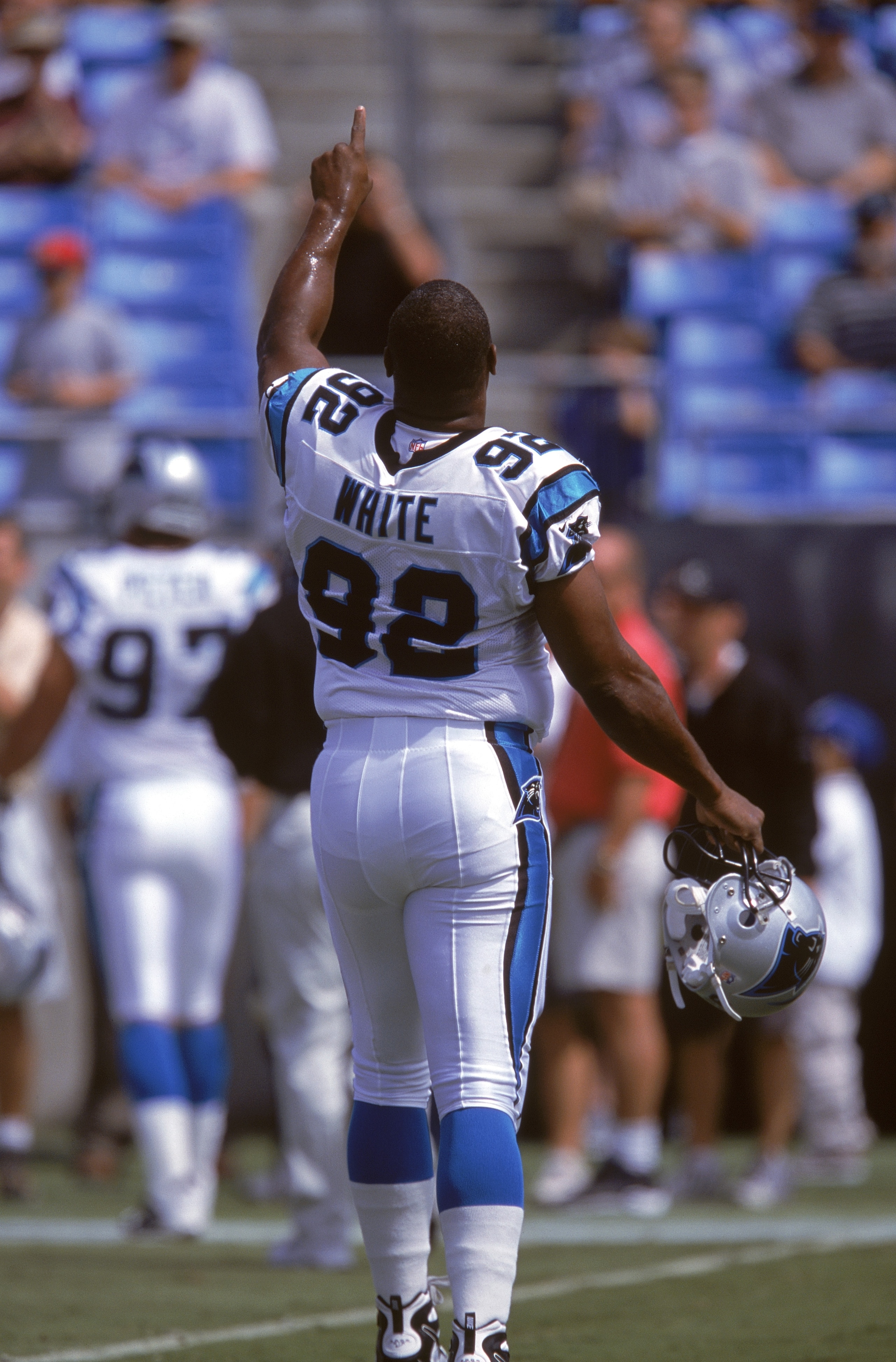 CHARLOTTE, NC - SEPTEMBER 17: Defensive end Reggie White #92 of the Carolina Panthers points to the sky after pulling off his helmet at Ericsson Sadium on September 17, 2000 in Charlotte, North Carolina. (Photo by Craig Jones/Getty Images) CHARLOTTE, NC - SEPTEMBER 17: Defensive end Reggie White #92 of the Carolina Panthers points to the sky after pulling off his helmet at Ericsson Sadium on September 17, 2000 in Charlotte, North Carolina. (Photo by Craig Jones/Getty Images)