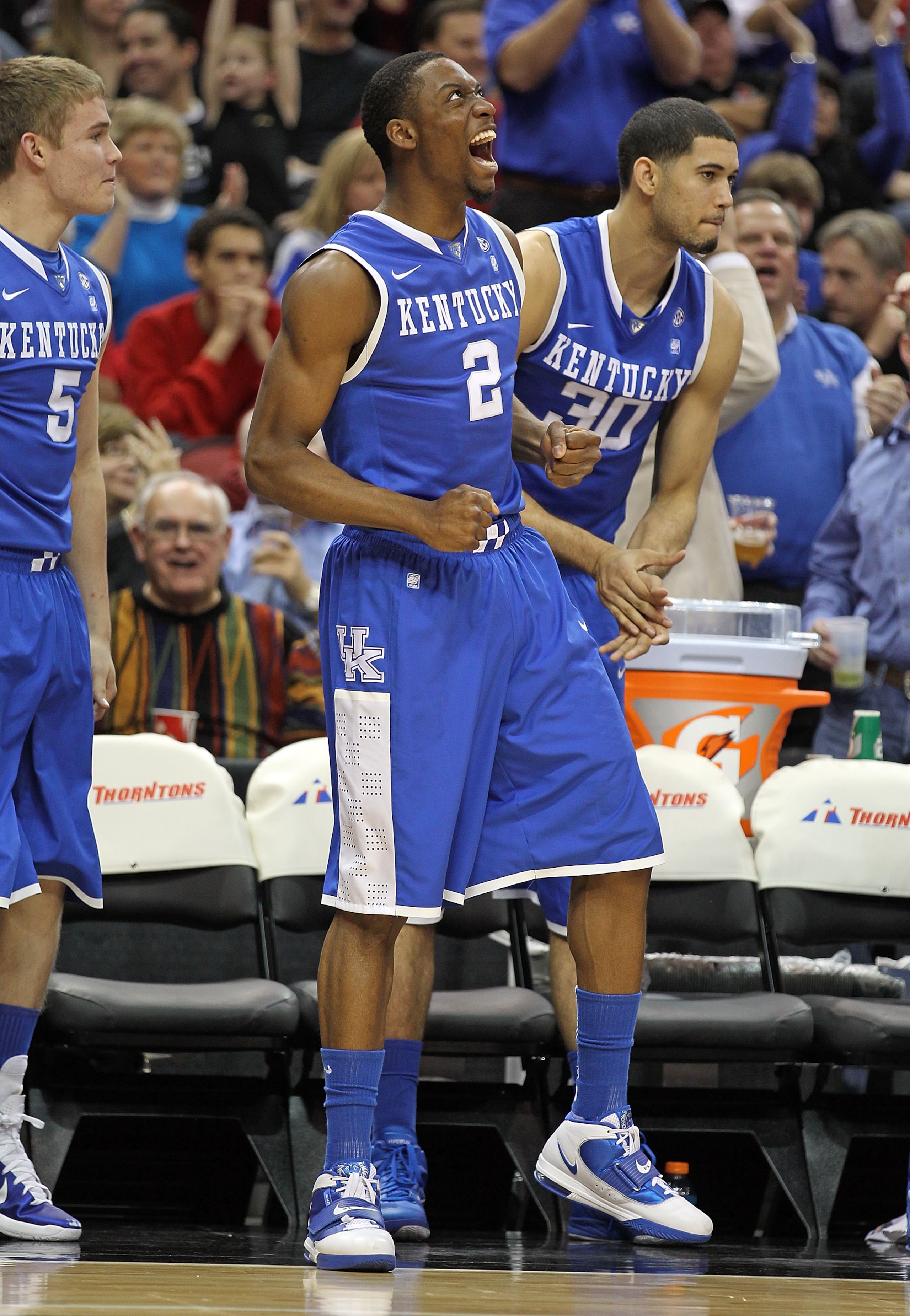 LOUISVILLE, KY - DECEMBER 31:  Stacey Poole #2 of the Kentucky Wildcats celebrates during the game against the Louisville Cardinals at the KFC Yum! Center on December 31, 2010 in Louisville, Kentucky. Kentucky won 78-63.  (Photo by Andy Lyons/Getty Images