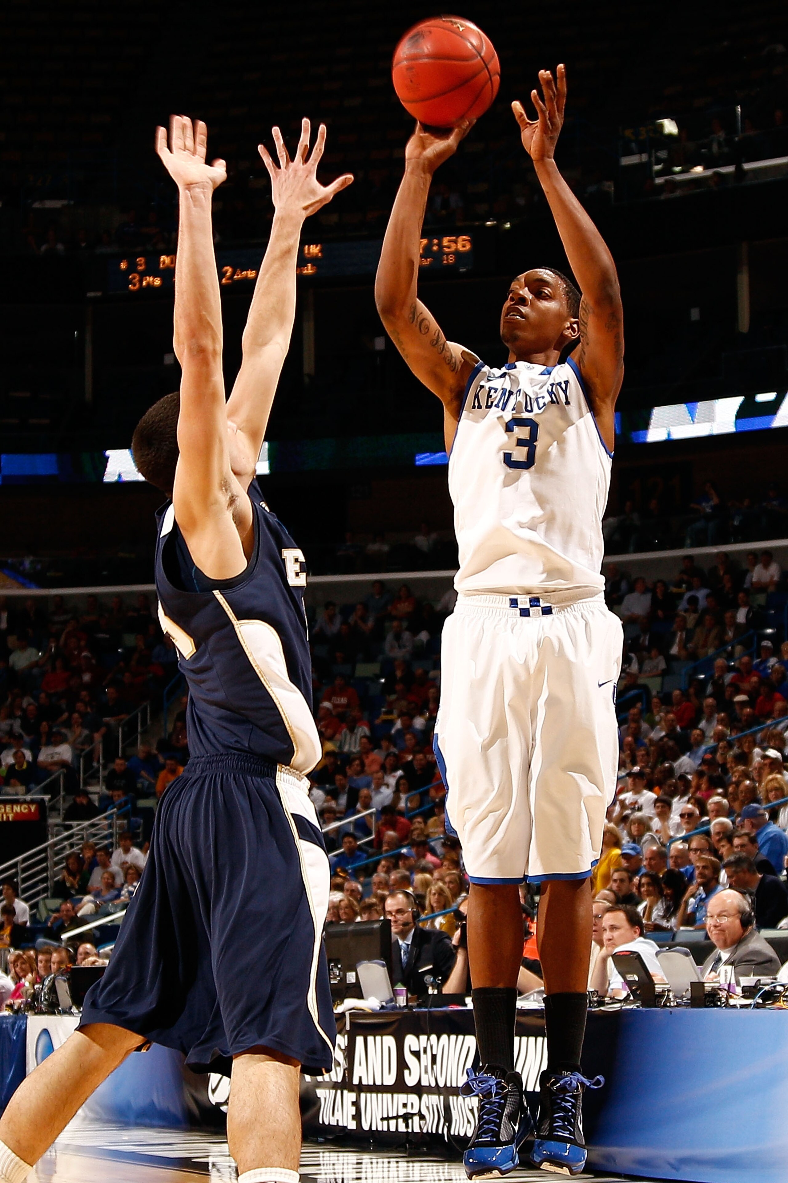 NEW ORLEANS - MARCH 18:  Jon Hood #4 of the Kentucky Wildcats shoots the ball over Adam Sollazzo #43 of the East Tennessee State Buccaneers during the first round of the 2010 NCAA men's basketball tournament at the New Orleans Arena on March 18, 2010 in N