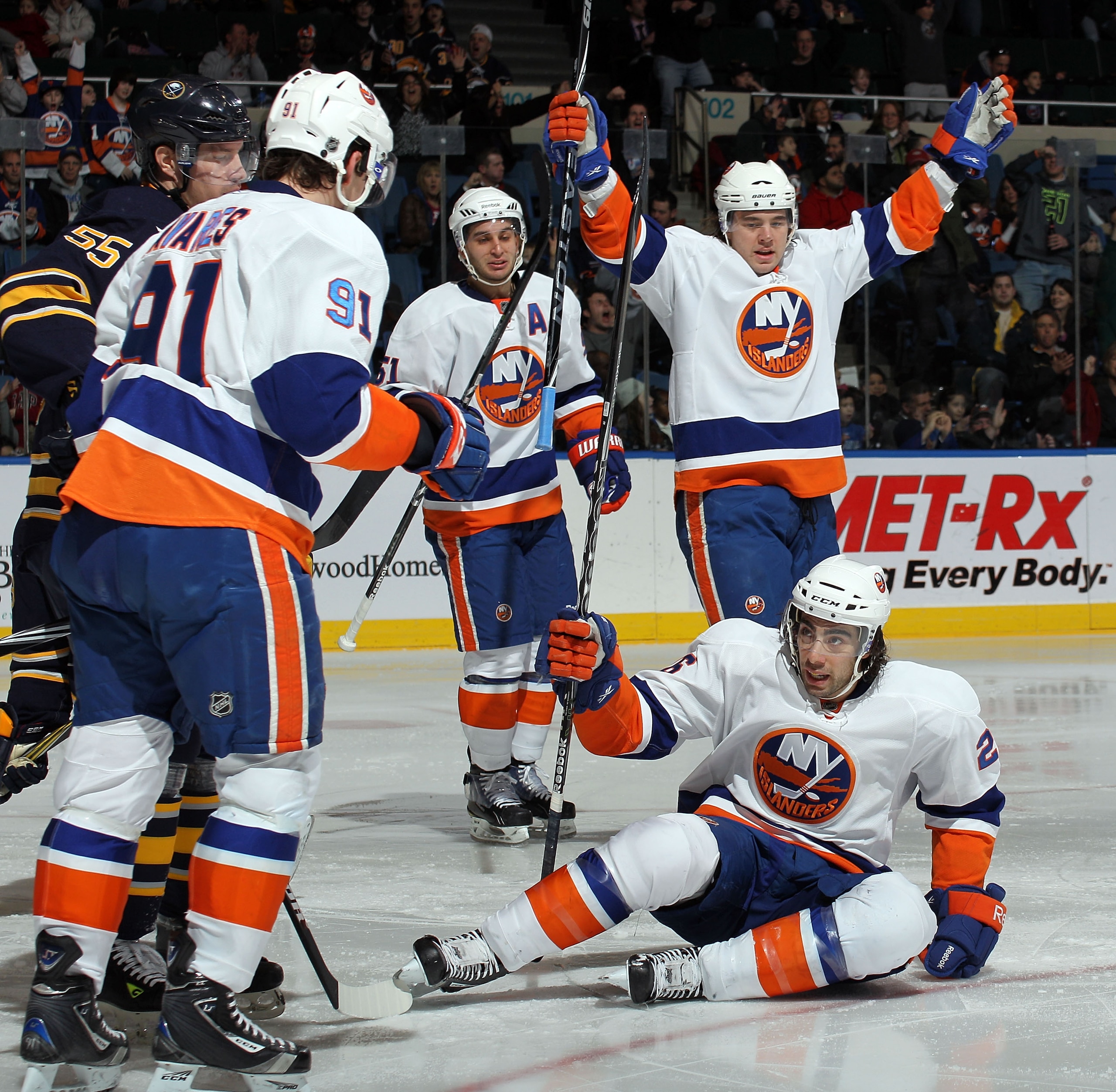 UNIONDALE, NY - JANUARY 23: Matt Moulson #26 (seated) of the New York Islanders scores a goal at 1:15 of the second period against the Buffalo Sabres at the Nassau Coliseum on January 23, 2011 in Uniondale, New York. (Photo by Bruce Bennett/Getty Images UNIONDALE, NY - JANUARY 23: Matt Moulson #26 (seated) of the New York Islanders scores a goal at 1:15 of the second period against the Buffalo Sabres at the Nassau Coliseum on January 23, 2011 in Uniondale, New York. (Photo by Bruce Bennett/Getty Images