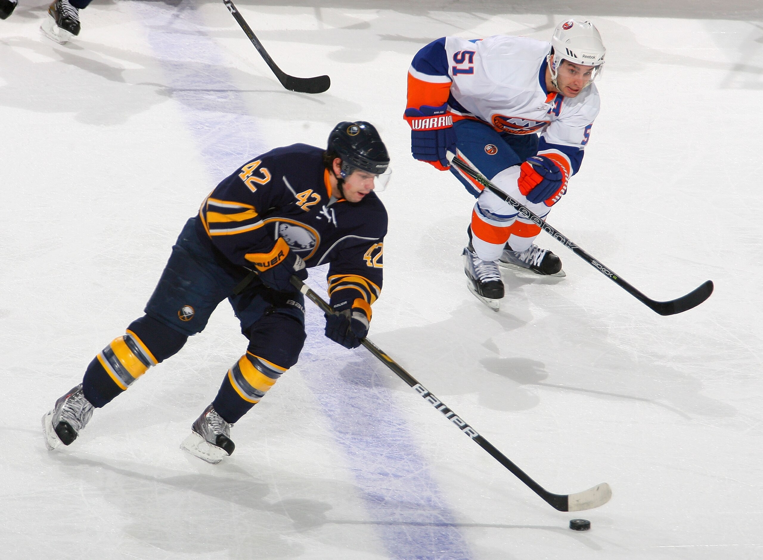BUFFALO, NY - JANUARY 21: Nathan Gerbe #42 of the Buffalo Sabres skates against Frans Nielsen #51 of the New York Islanders at HSBC Arena on January 21, 2011 in Buffalo, New York. (Photo by Rick Stewart/Getty Images) BUFFALO, NY - JANUARY 21: Nathan Gerbe #42 of the Buffalo Sabres skates against Frans Nielsen #51 of the New York Islanders at HSBC Arena on January 21, 2011 in Buffalo, New York. (Photo by Rick Stewart/Getty Images)