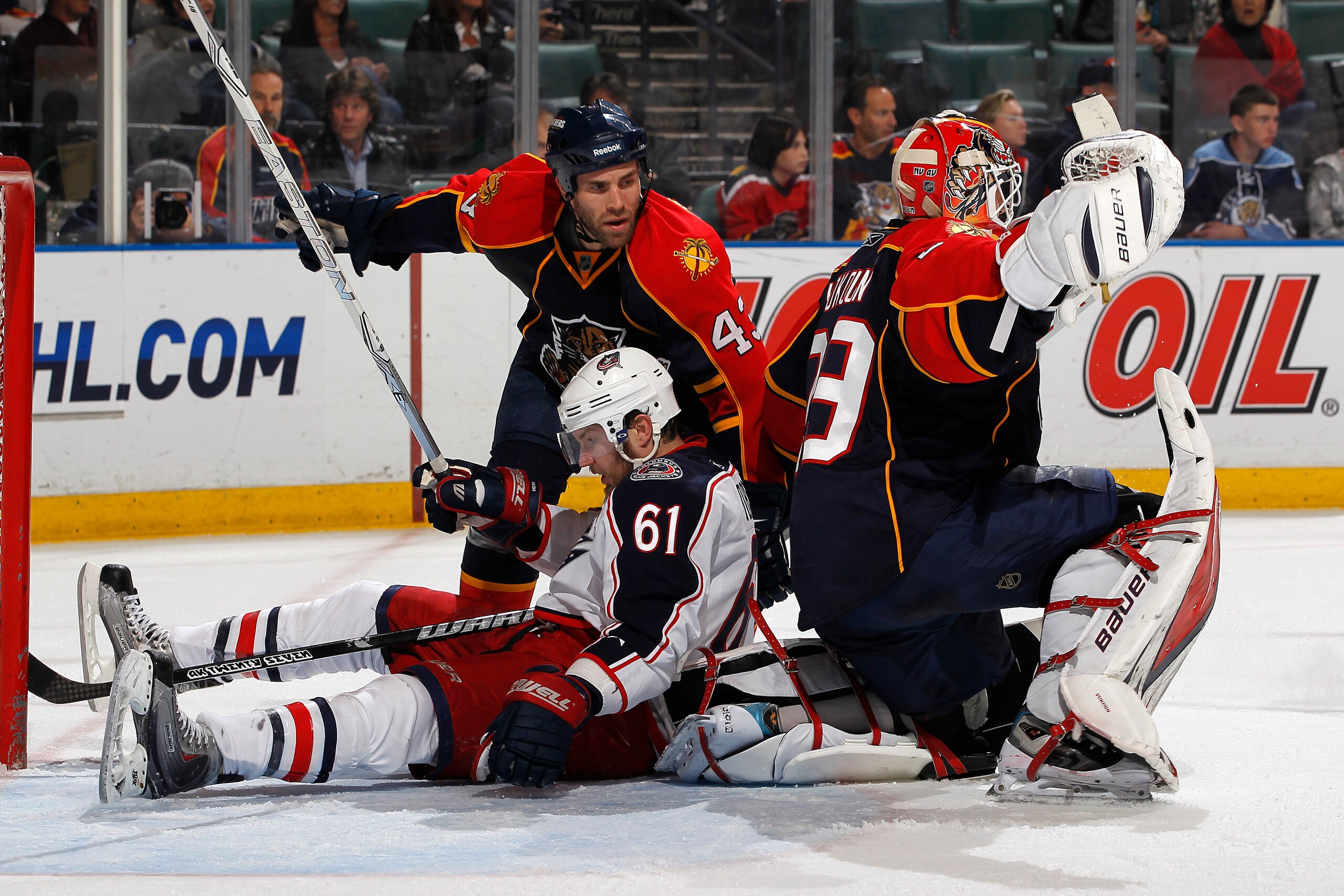 SUNRISE, FL - JANUARY 19: Rick Nash #61 of the Columbus Blue Jackets gets checked to the ice behind goaltender Tomas Vokoun #29 of the Florida Panthers on January 19, 2011 at the BankAtlantic Center in Sunrise, Florida. (Photo by Joel Auerbach/Getty Image SUNRISE, FL - JANUARY 19: Rick Nash #61 of the Columbus Blue Jackets gets checked to the ice behind goaltender Tomas Vokoun #29 of the Florida Panthers on January 19, 2011 at the BankAtlantic Center in Sunrise, Florida. (Photo by Joel Auerbach/Getty Image