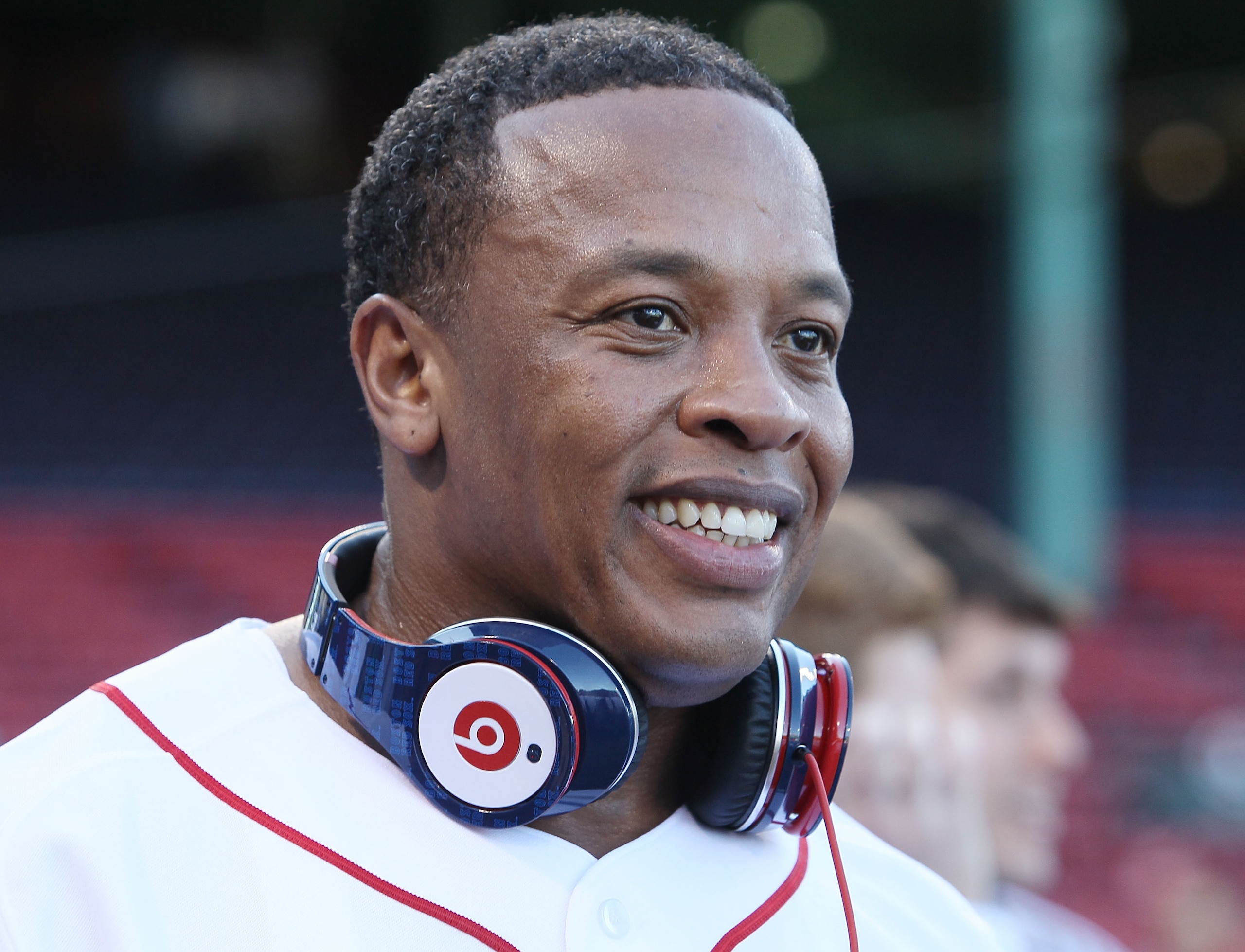 BOSTON - APRIL 04:  Producer and musician Dr. Dre is on the field before the Boston Red Sox take on the the New York Yankees on April 4, 2010 during Opening Night at Fenway Park in Boston, Massachusetts. Dre is promoting the Boston Red Sox version of his