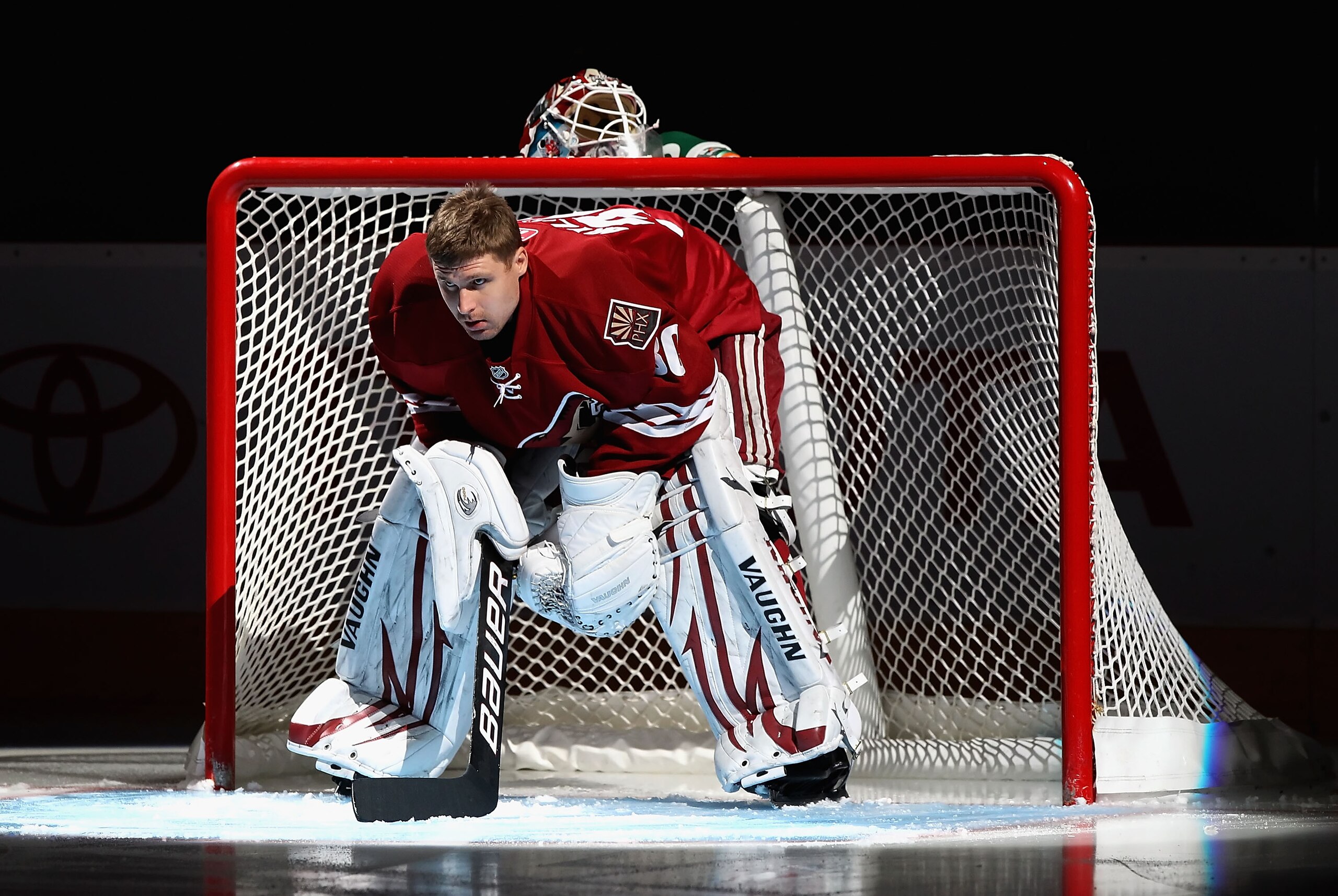 GLENDALE, AZ - JANUARY 22: Goaltender Ilya Bryzgalov #30 of the Phoenix Coyotes is introduced before the NHL game against the Los Angeles Kings at Jobing.com Arena on January 22, 2011 in Glendale, Arizona. The Kings defeated the Coyotes 4-3. (Photo by C GLENDALE, AZ - JANUARY 22: Goaltender Ilya Bryzgalov #30 of the Phoenix Coyotes is introduced before the NHL game against the Los Angeles Kings at Jobing.com Arena on January 22, 2011 in Glendale, Arizona. The Kings defeated the Coyotes 4-3. (Photo by C