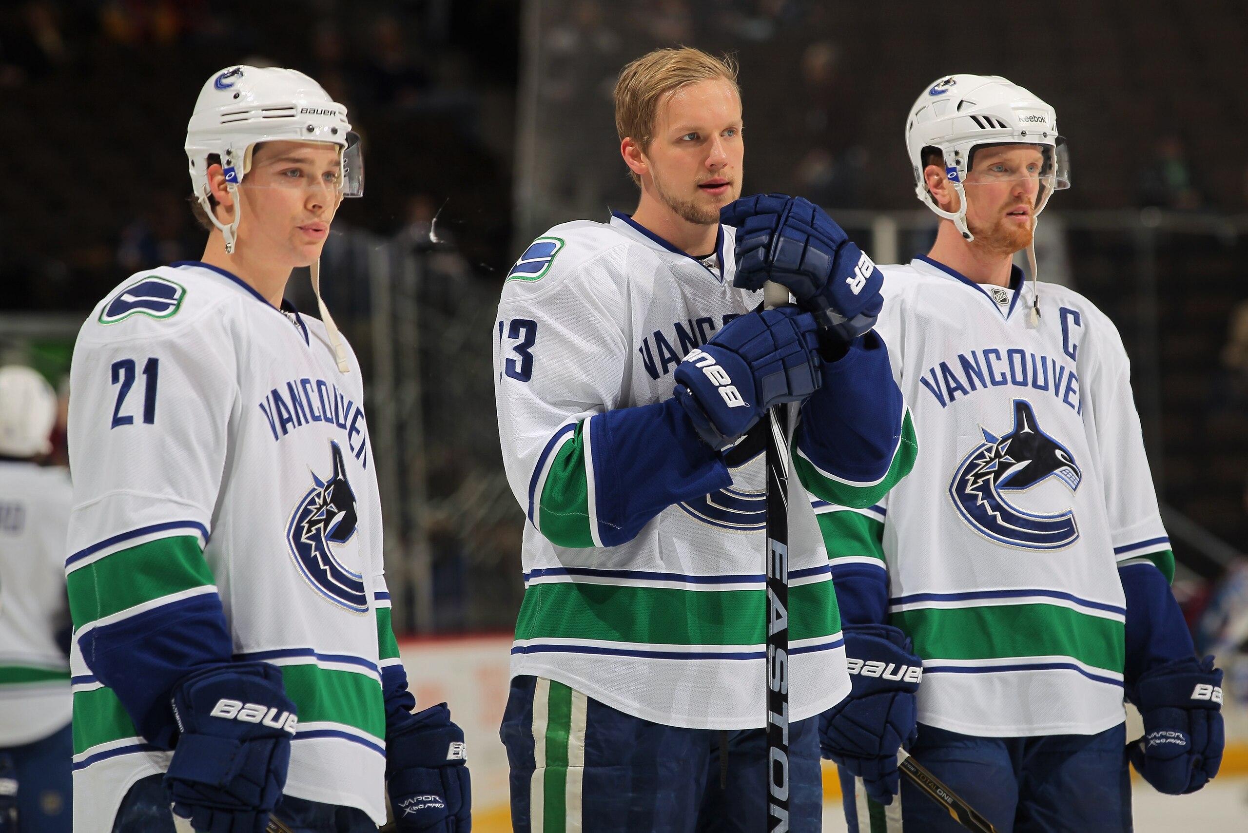 DENVER, CO - JANUARY 18: Mason Raymond #21, Alexander Edler #23 and Henrik Sedin #33 of the Vancouver Canucks warm up prior to facing the Colorado Avalanche at the Pepsi Center on January 18, 2011 in Denver, Colorado. The Avalanche defeated the Canucks 4 DENVER, CO - JANUARY 18: Mason Raymond #21, Alexander Edler #23 and Henrik Sedin #33 of the Vancouver Canucks warm up prior to facing the Colorado Avalanche at the Pepsi Center on January 18, 2011 in Denver, Colorado. The Avalanche defeated the Canucks 4
