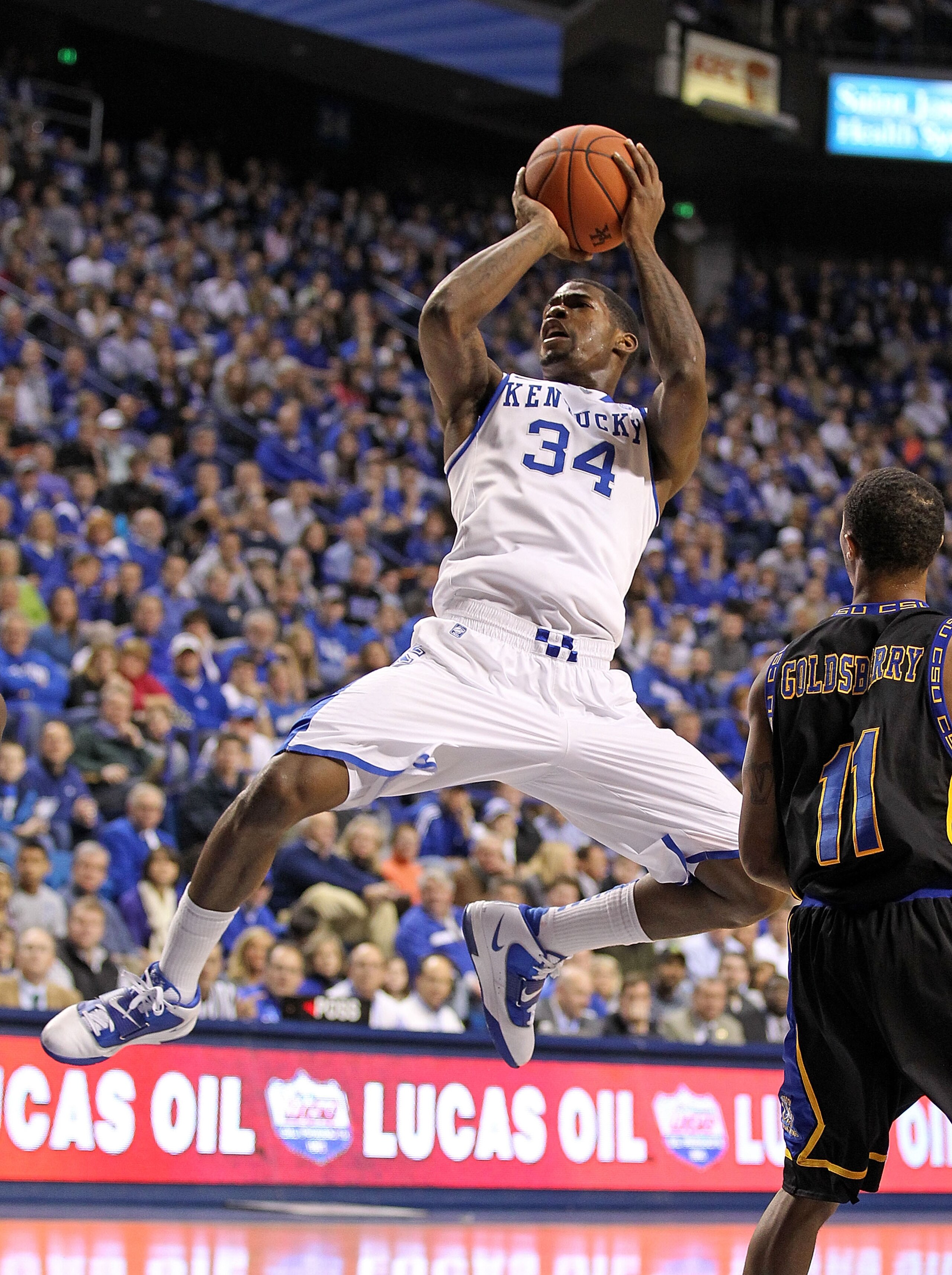LEXINGTON, KY - DECEMBER 28:  DeAndre Liggins #34 of the Kentucky Wildcats shoots the ball during the game against the Coppin State Eagles at Rupp Arena on December 28, 2010 in Lexington, Kentucky.  Kentucky won 91-61.  (Photo by Andy Lyons/Getty Images)