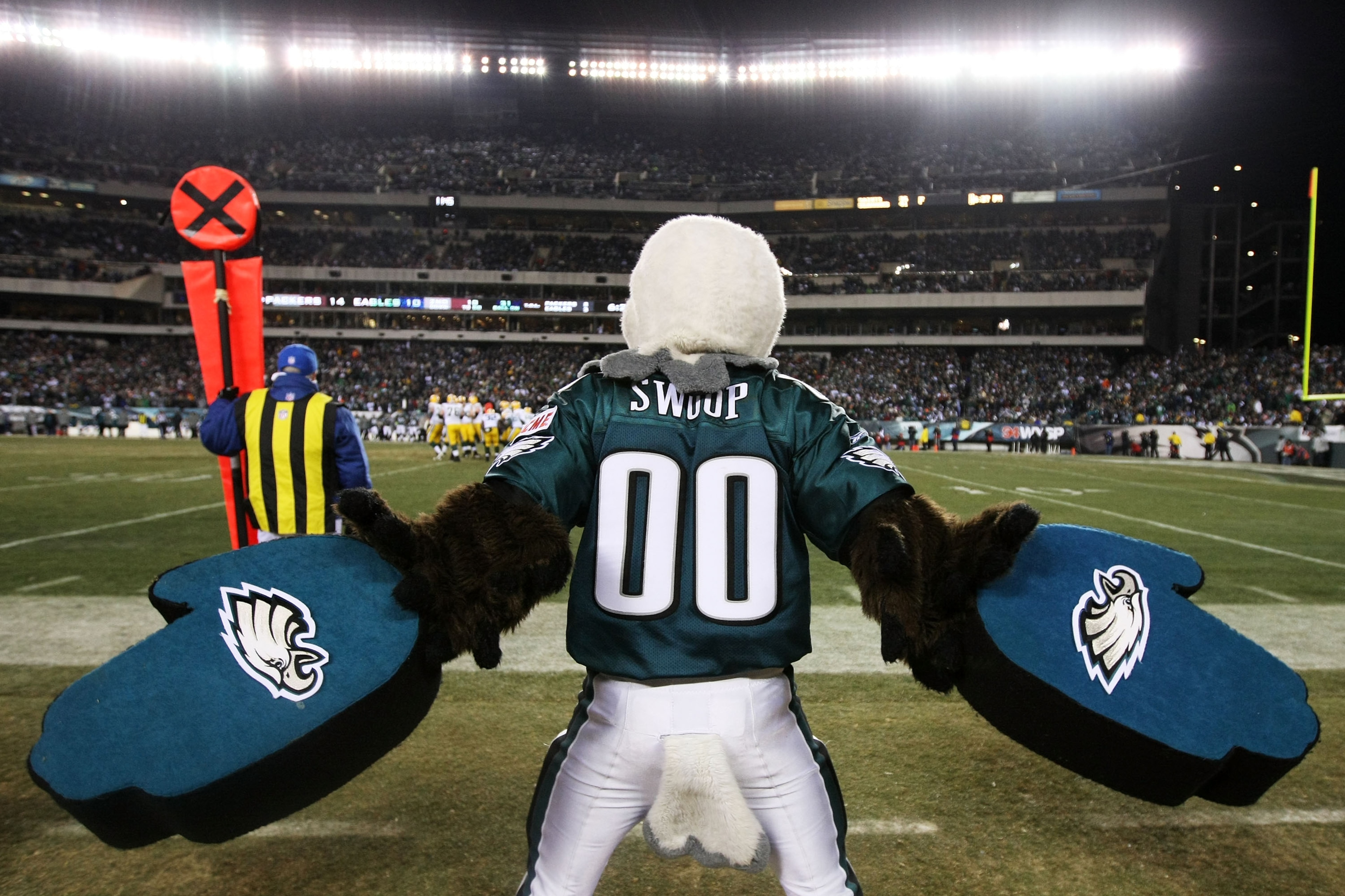 PHILADELPHIA, PA - JANUARY 09: Philadelphia Eagles mascot Swoop cheers on the sidelines against the Green Bay Packers during the 2011 NFC wild card playoff game at Lincoln Financial Field on January 9, 2011 in Philadelphia, Pennsylvania. (Photo by Al Be PHILADELPHIA, PA - JANUARY 09: Philadelphia Eagles mascot Swoop cheers on the sidelines against the Green Bay Packers during the 2011 NFC wild card playoff game at Lincoln Financial Field on January 9, 2011 in Philadelphia, Pennsylvania. (Photo by Al Be