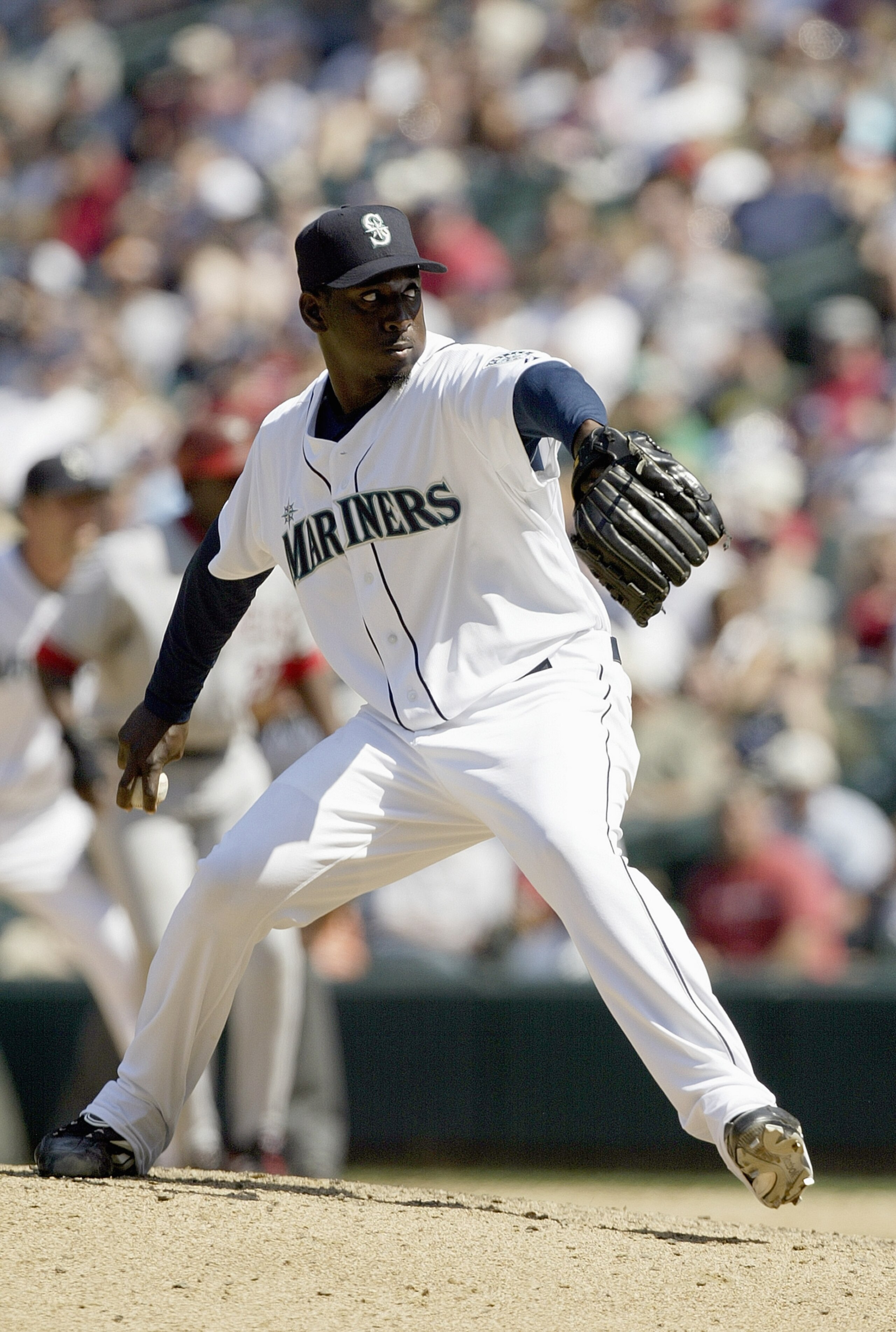 SEATTLE - JULY 4:  Rafael Soriano #39 of the Seattle Mariners winds back to pitch during the game against the Los Angeles Angels of Anaheim on July 4, 2006 at Safeco Field in Seattle Washington. The Angels won 14-6. (Photo by Otto Greule Jr/Getty Images)