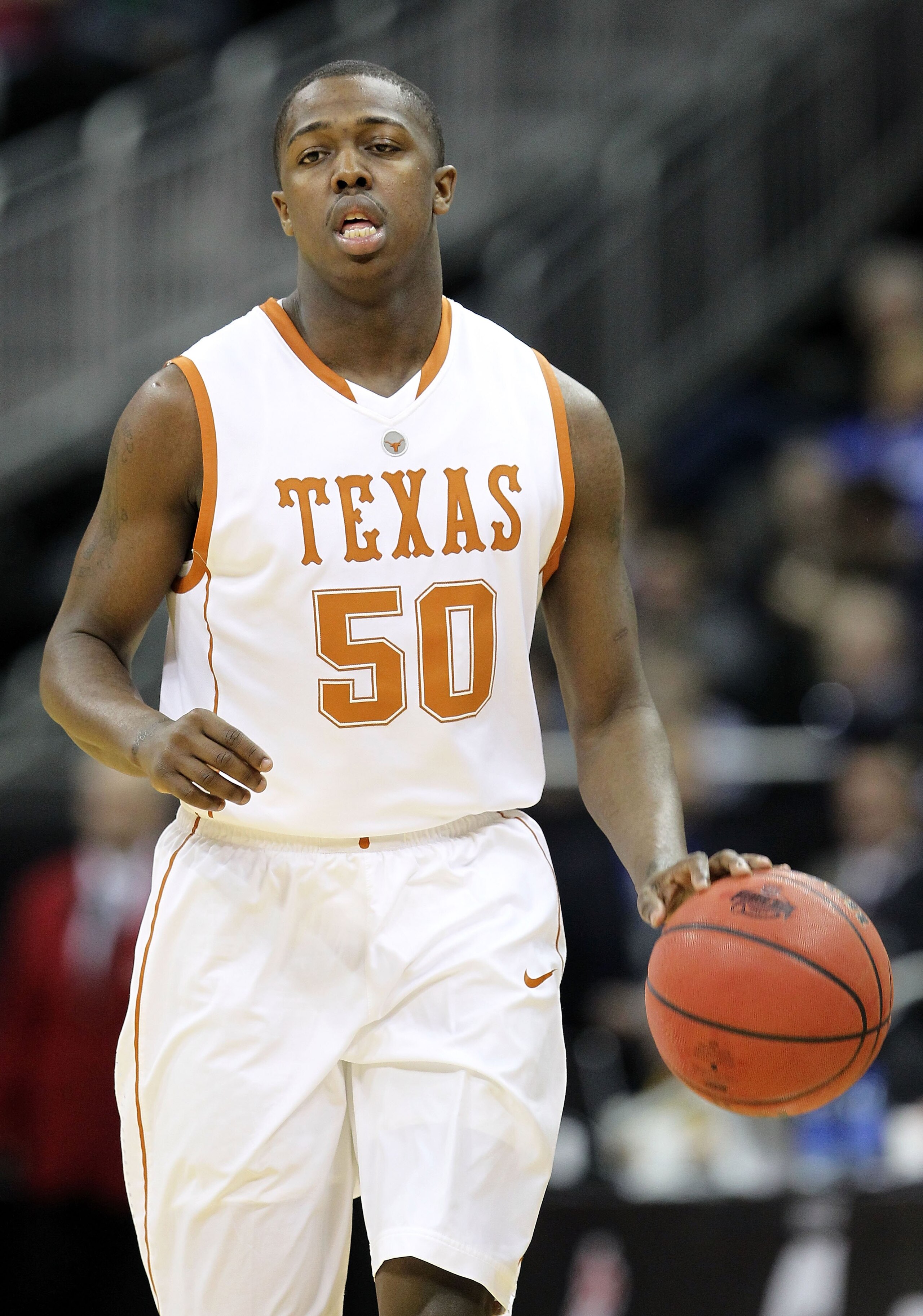KANSAS CITY, MO - MARCH 10: J'Covan Brown #50 of the Texas Longhorns moves the ball against the Iowa State Cyclones during the first round game of the 2010 Phillips 66 Big 12 Men's Basketball Tournament at the Sprint Center on March 10, 2010 in Kansas Ci KANSAS CITY, MO - MARCH 10: J'Covan Brown #50 of the Texas Longhorns moves the ball against the Iowa State Cyclones during the first round game of the 2010 Phillips 66 Big 12 Men's Basketball Tournament at the Sprint Center on March 10, 2010 in Kansas Ci