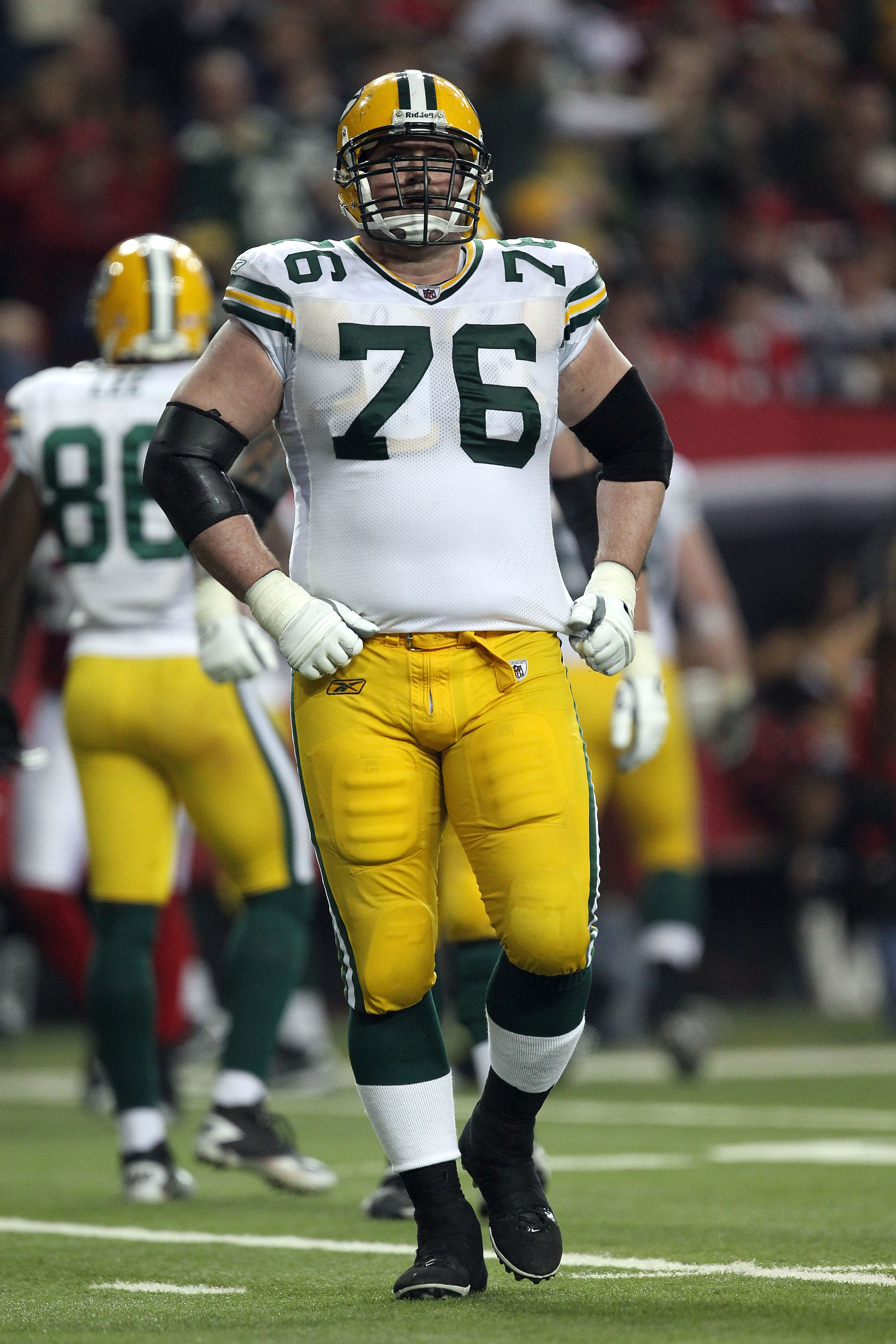 ATLANTA, GA - JANUARY 15:  Chad Clifton #76 of the Green Bay Packers looks on against the Atlanta Falcons during their 2011 NFC divisional playoff game at Georgia Dome on January 15, 2011 in Atlanta, Georgia. The Packers won 48-21. (Photo by Streeter Leck