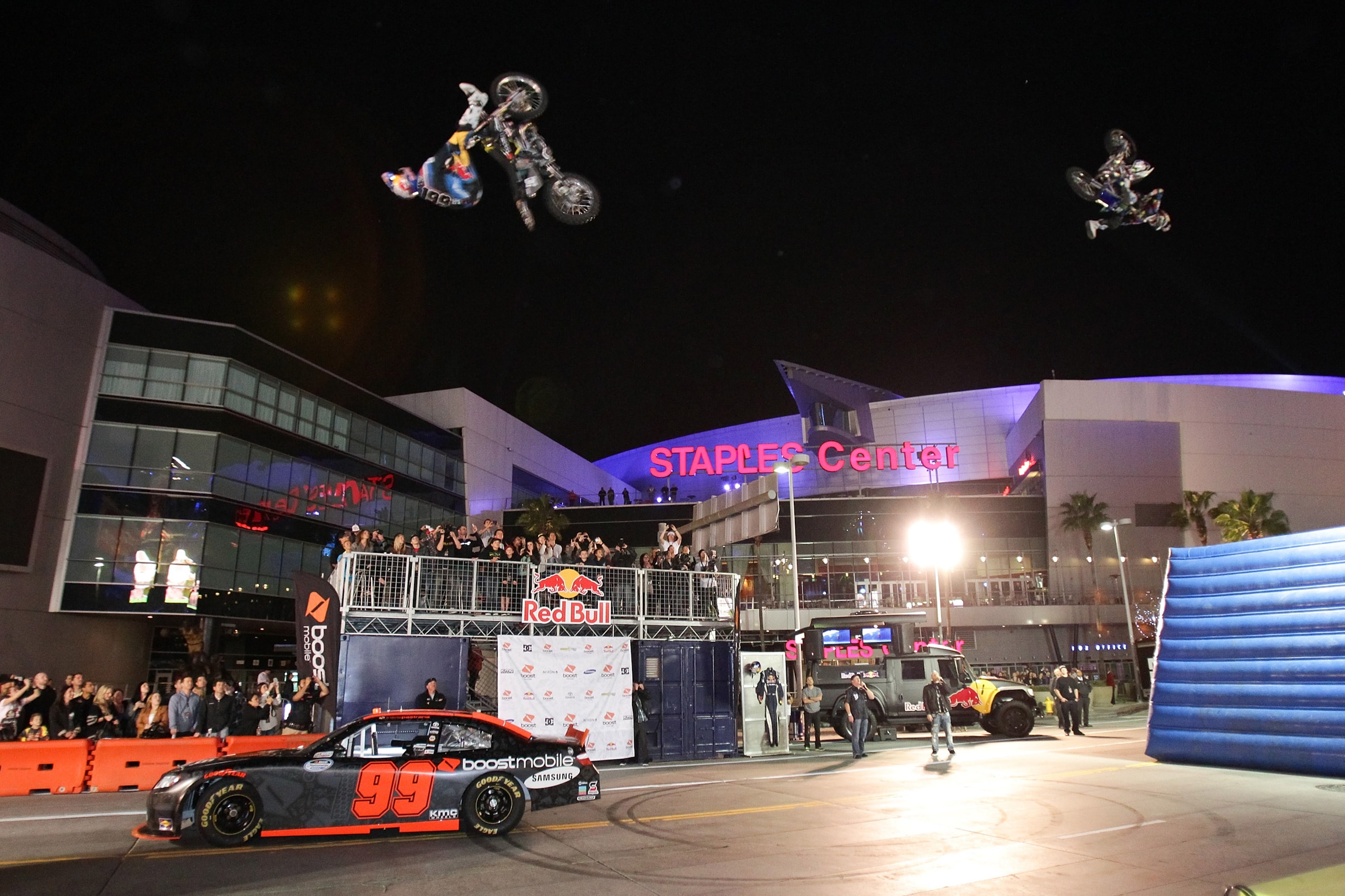 LOS ANGELES, CA - JANUARY 21:  Travis Pastrana (L) and Nate Adams perform a freestyle motocross demo at the Pastrana-Waltrip Racing announcement of the 2011 NASCAR Nationwide partnership on January 21, 2011 in Los Angeles, California.  (Photo by Noel Vasq