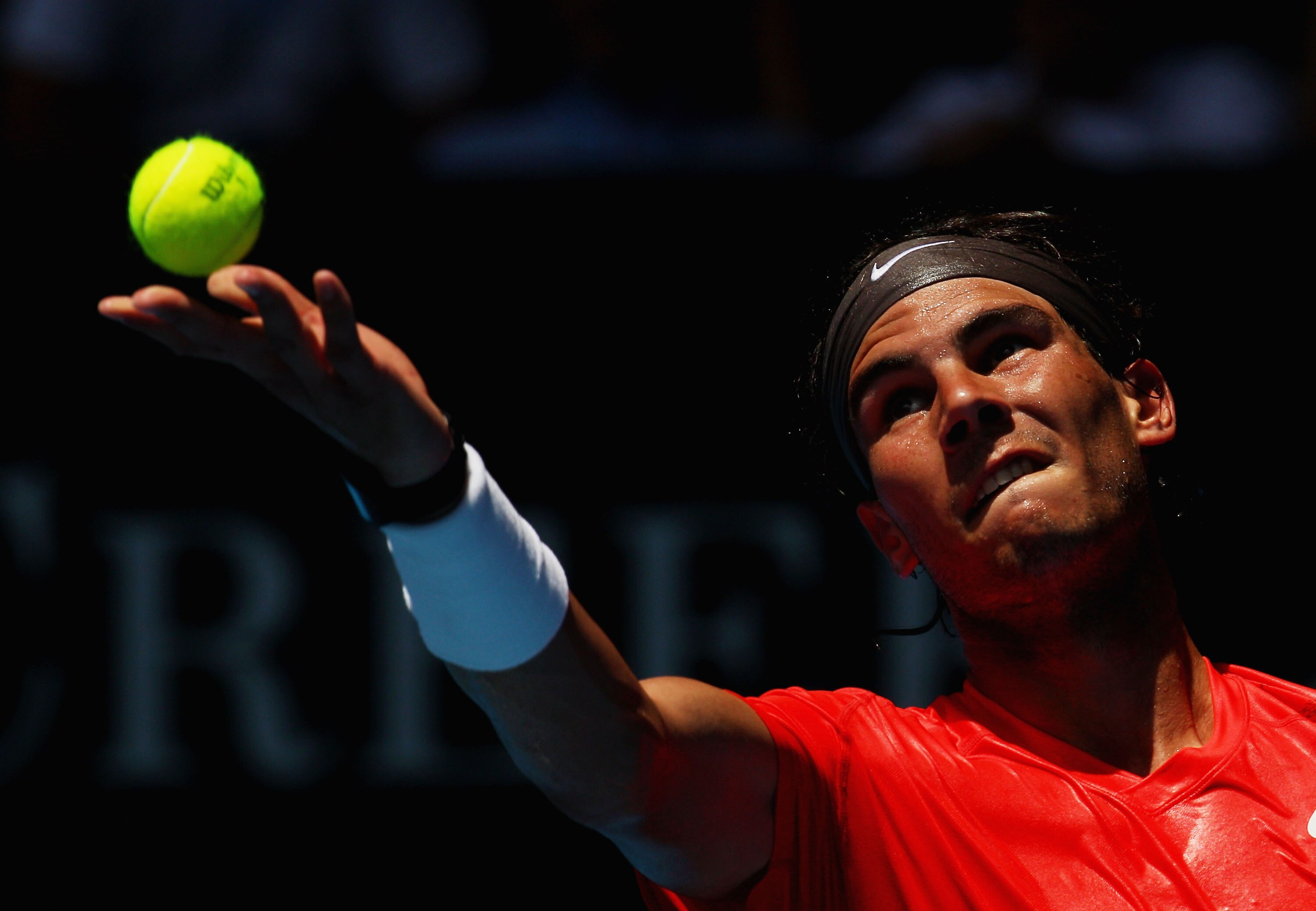MELBOURNE, AUSTRALIA - JANUARY 20:  Rafael Nadal of Spain serves in his second round match against Ryan Sweeting of the United States of America during day four of the 2011 Australian Open at Melbourne Park on January 20, 2011 in Melbourne, Australia.  (P