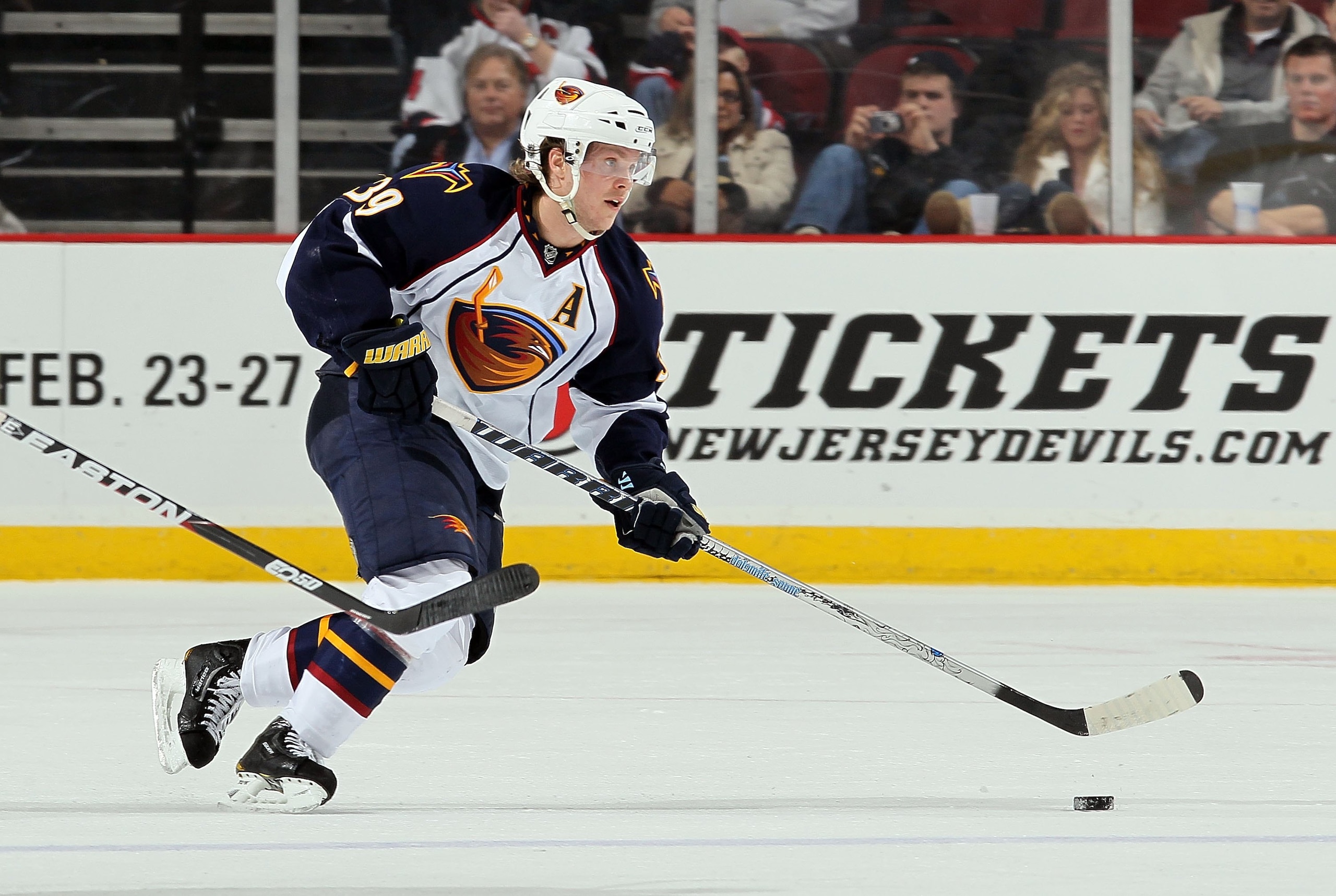 NEWARK, NJ - DECEMBER 31:  Tobias Enstrom #39 of the Atlanta Thrashers skates against the New Jersey Devils at the Prudential Center on December 31, 2010 in Newark, New Jersey. The Devils defeated the Thrashers 3-1.  (Photo by Jim McIsaac/Getty Images)