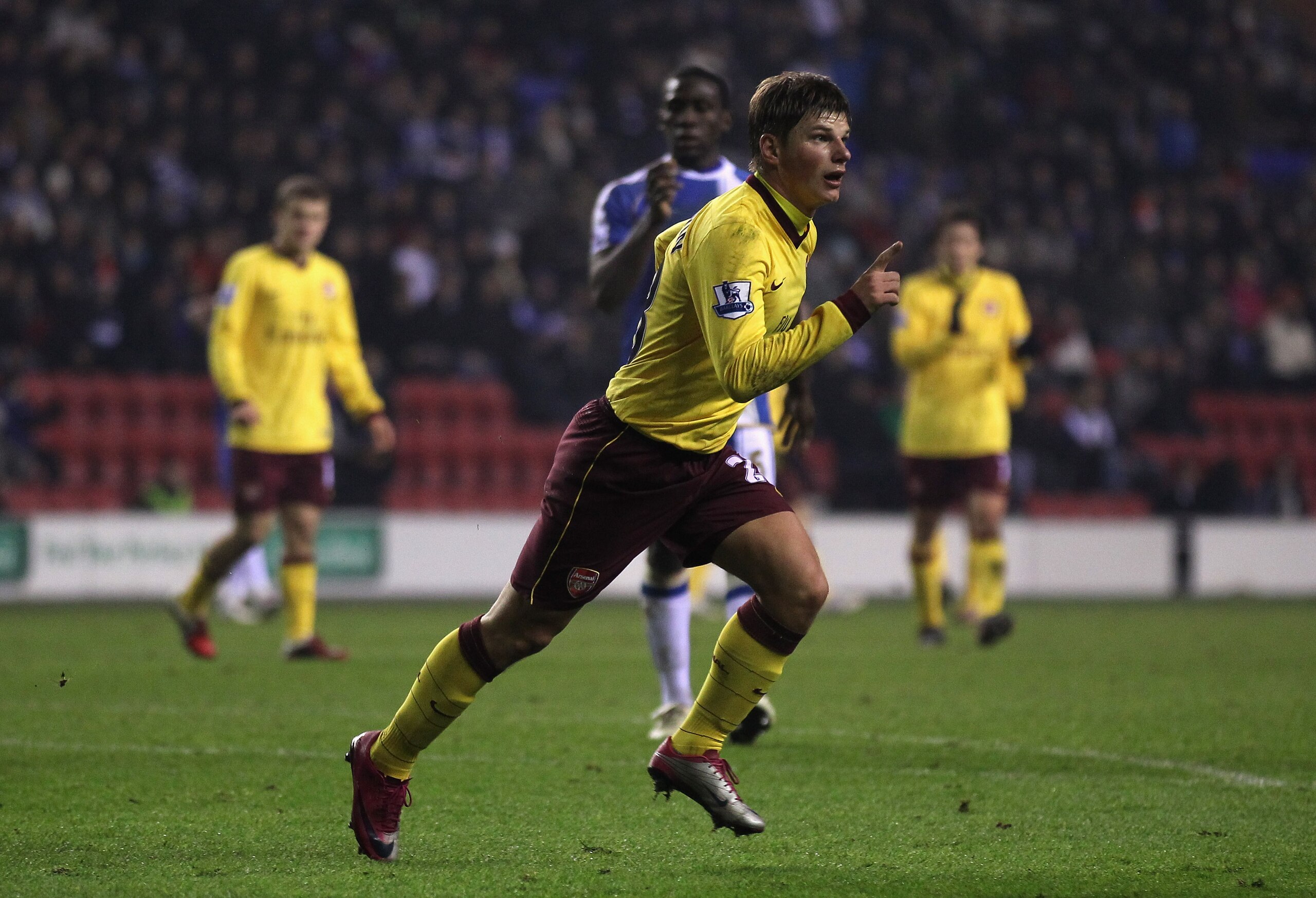 WIGAN, ENGLAND - DECEMBER 29:  Andrey Arshavin of Arsenal celebrates after scoring his goal during the Barclays Premier League match between Wigan Athletic and Arsenal at DW Stadium on December 29, 2010 in Wigan, England.  (Photo by Alex Livesey/Getty Ima