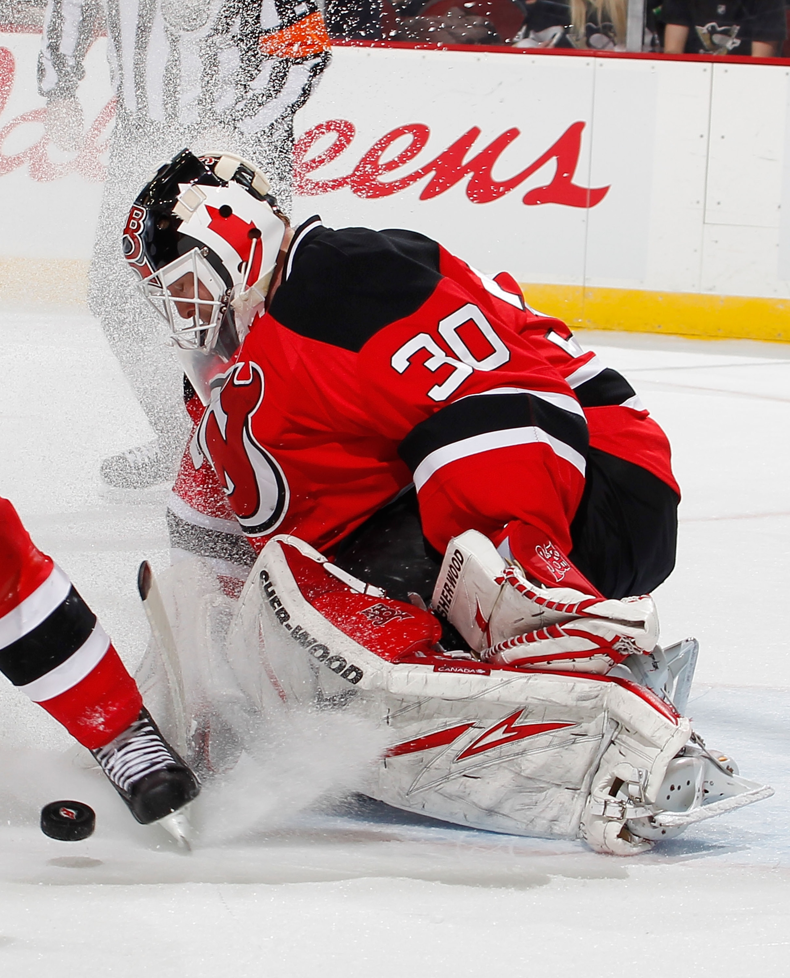 NEWARK, NJ - JANUARY 20:  Martin Brodeur #30 of the New Jersey Devils makes a save in the first period of an NHL hockey game against the Pittsburgh Penguins at the Prudential Center on January 20, 2011 in Newark, New Jersey.  Devils won 2-0. (Photo by Pau